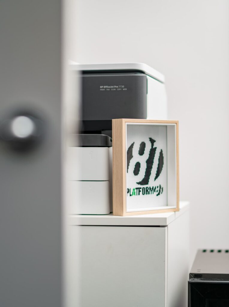people in a large building with Tate Modern in the background