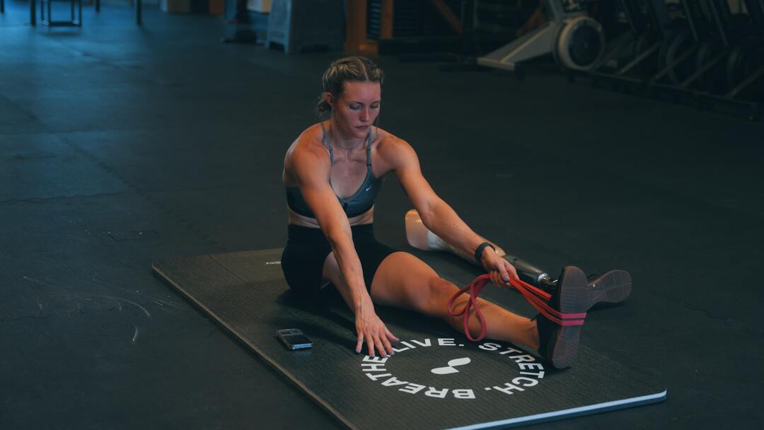 woman using adaptive bands - Resistance Band Mobility Exercises