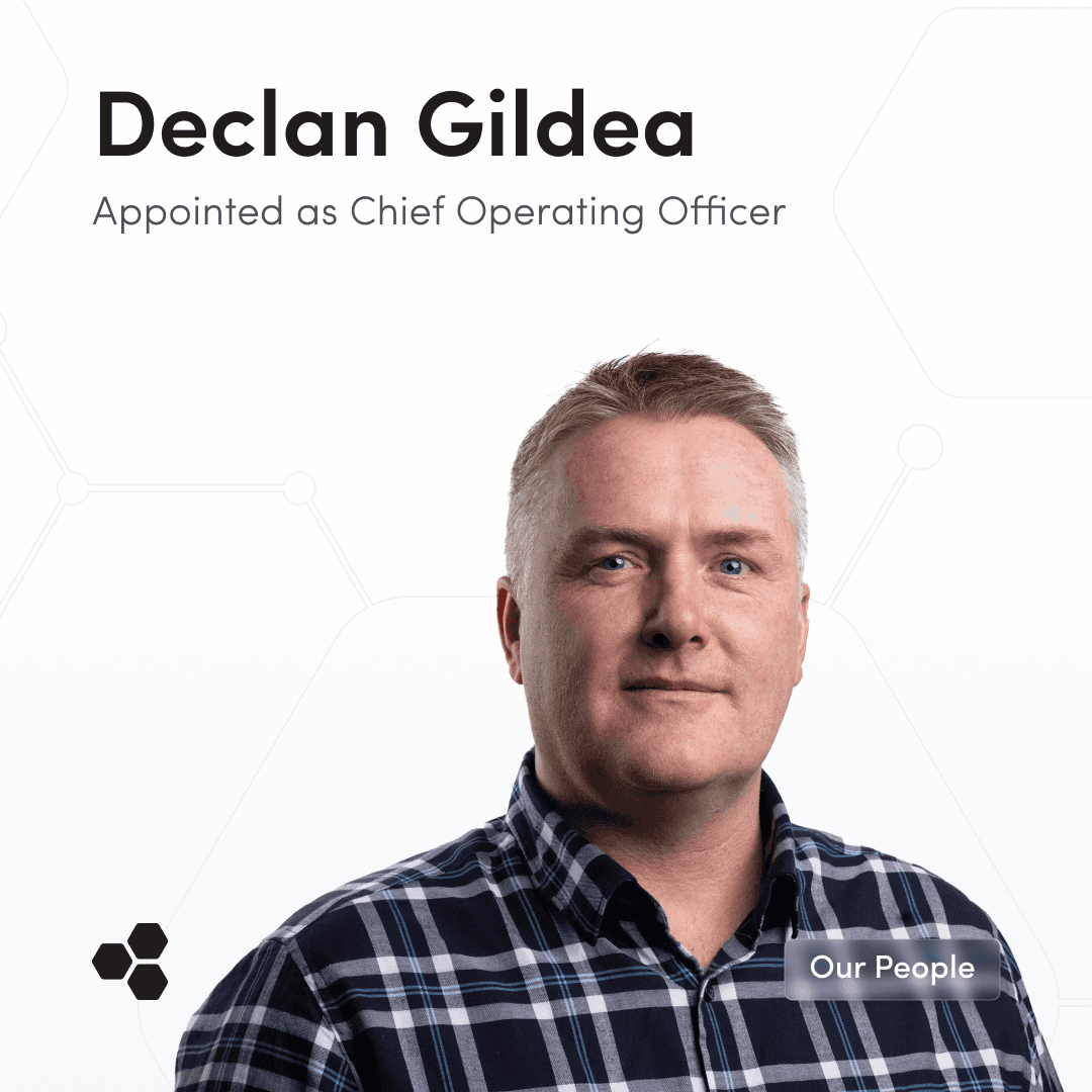 Declan Gildea, recently appointed Chief Operating Officer, pictured in a checkered shirt, looking directly at the camera with a confident expression. The image promotes his new role with a button prompting to ‘Read the release.’
