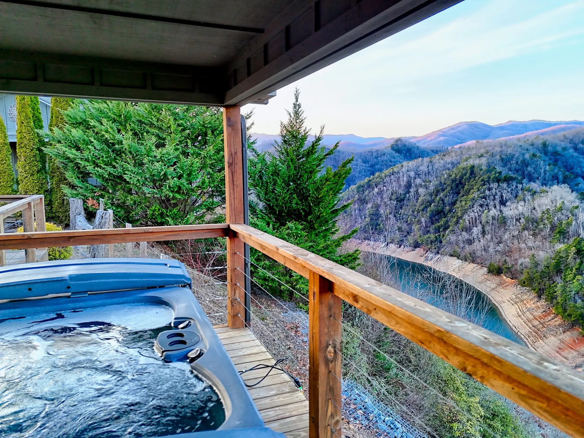 Eagles Nest hot tub at the deck rail above Fontana Lake