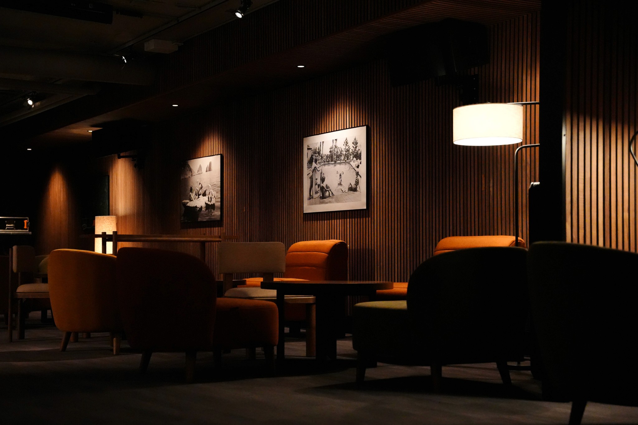 a large body of water with a mountain in the background