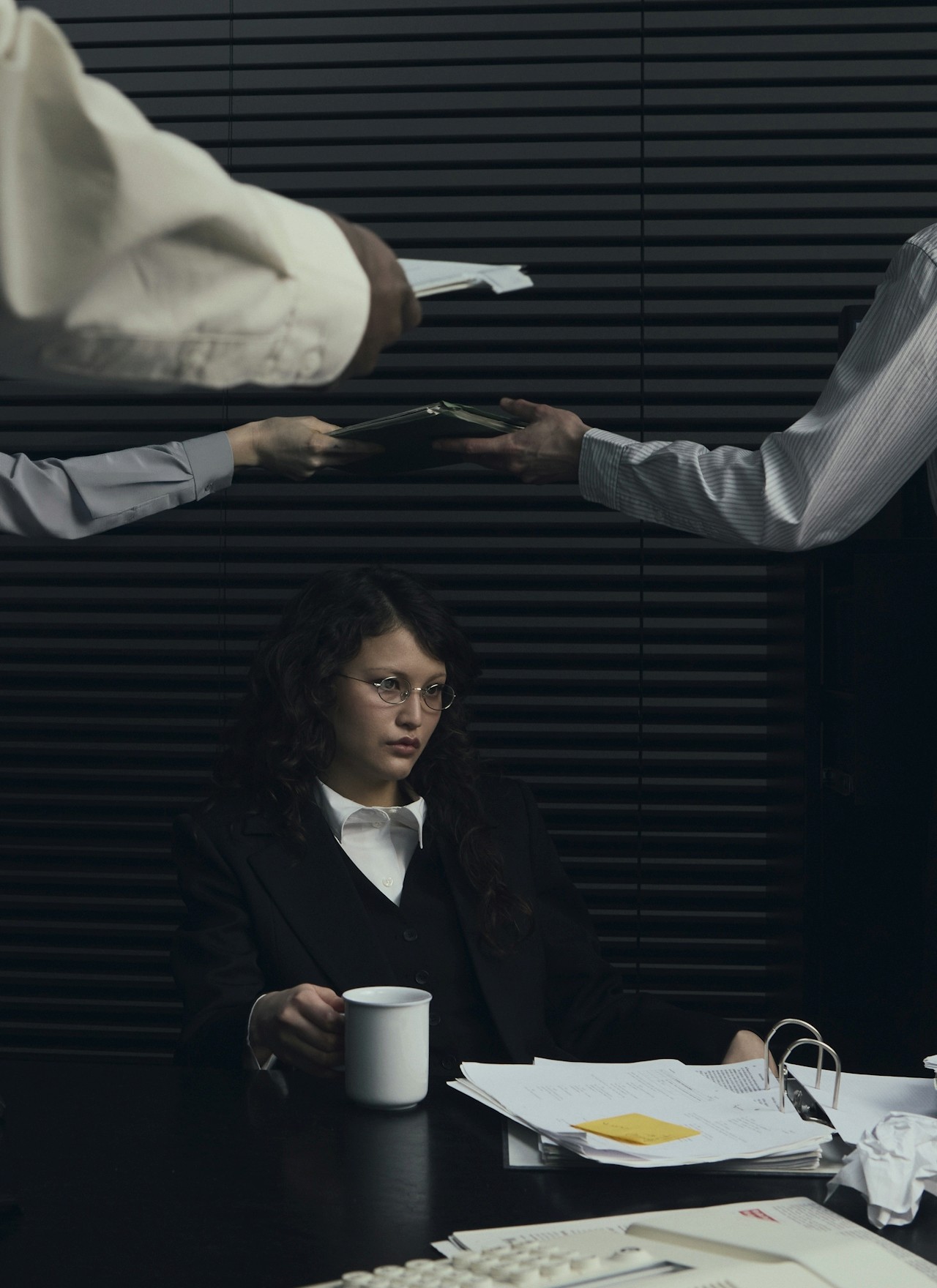 A women focused on her work in an office.