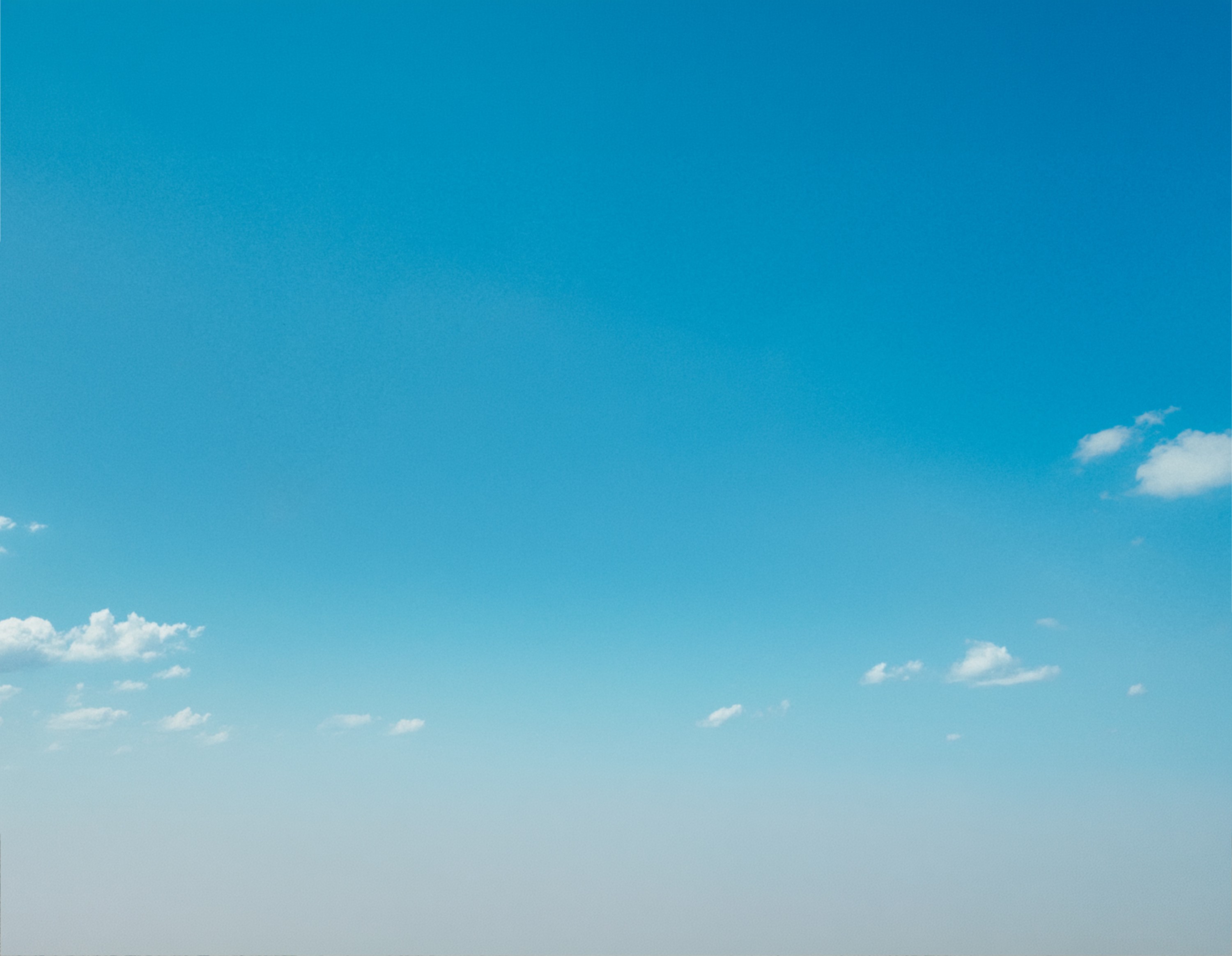 Fashion photoshoot with a woman posing in a dress
