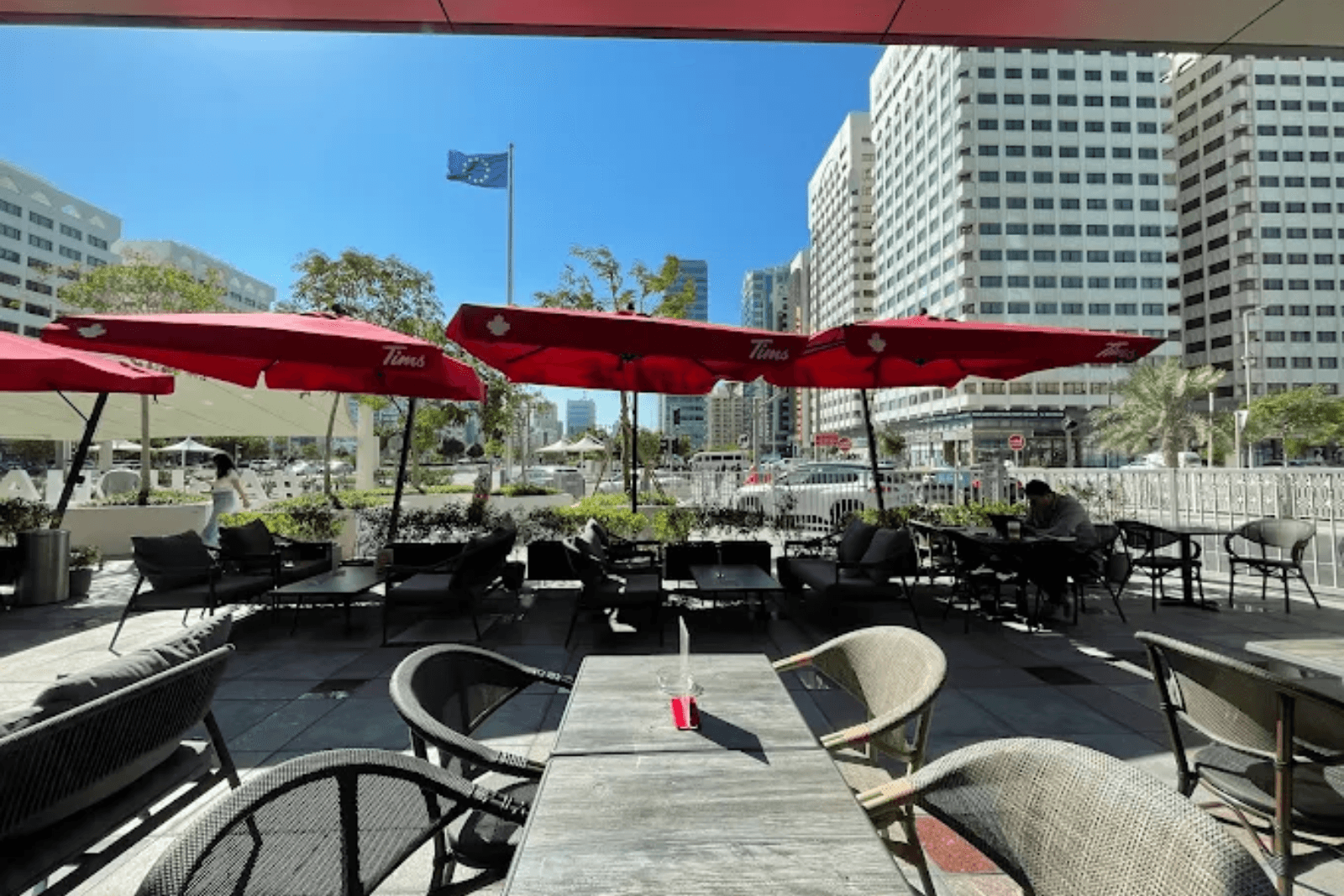 Outdoor seating area at Tim Hortons cafe in Abu Dhabi mall
