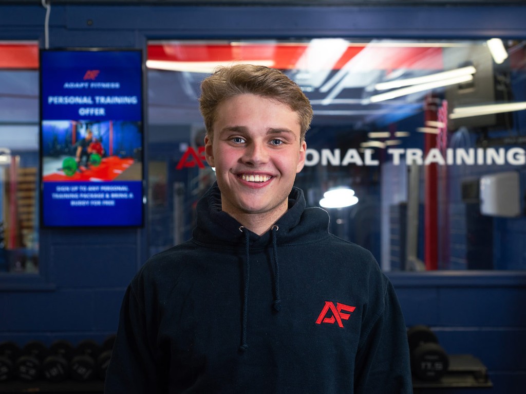 gym instructor wearing Adapt Fitness hoody