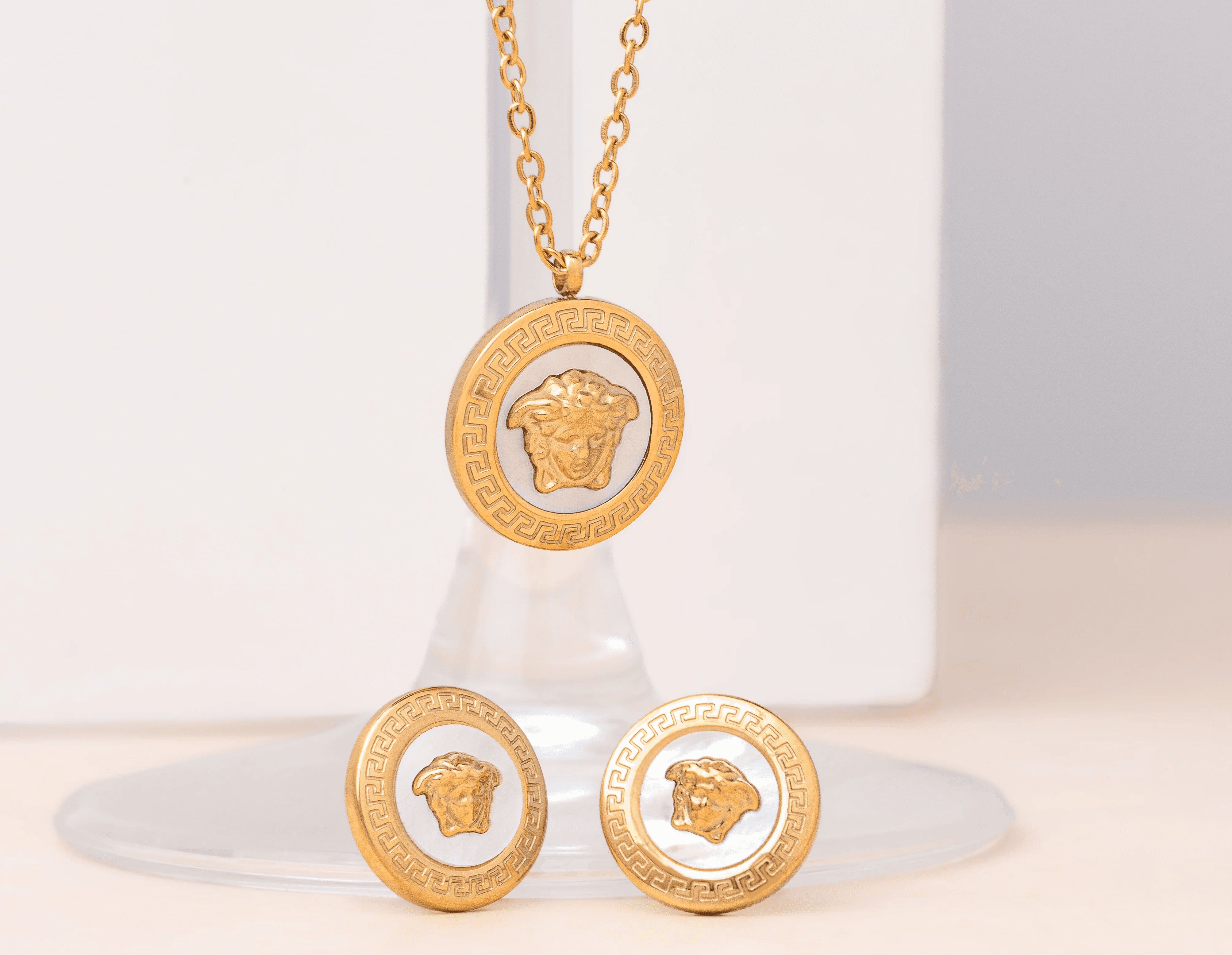 a gold ring with a diamond set on top of it