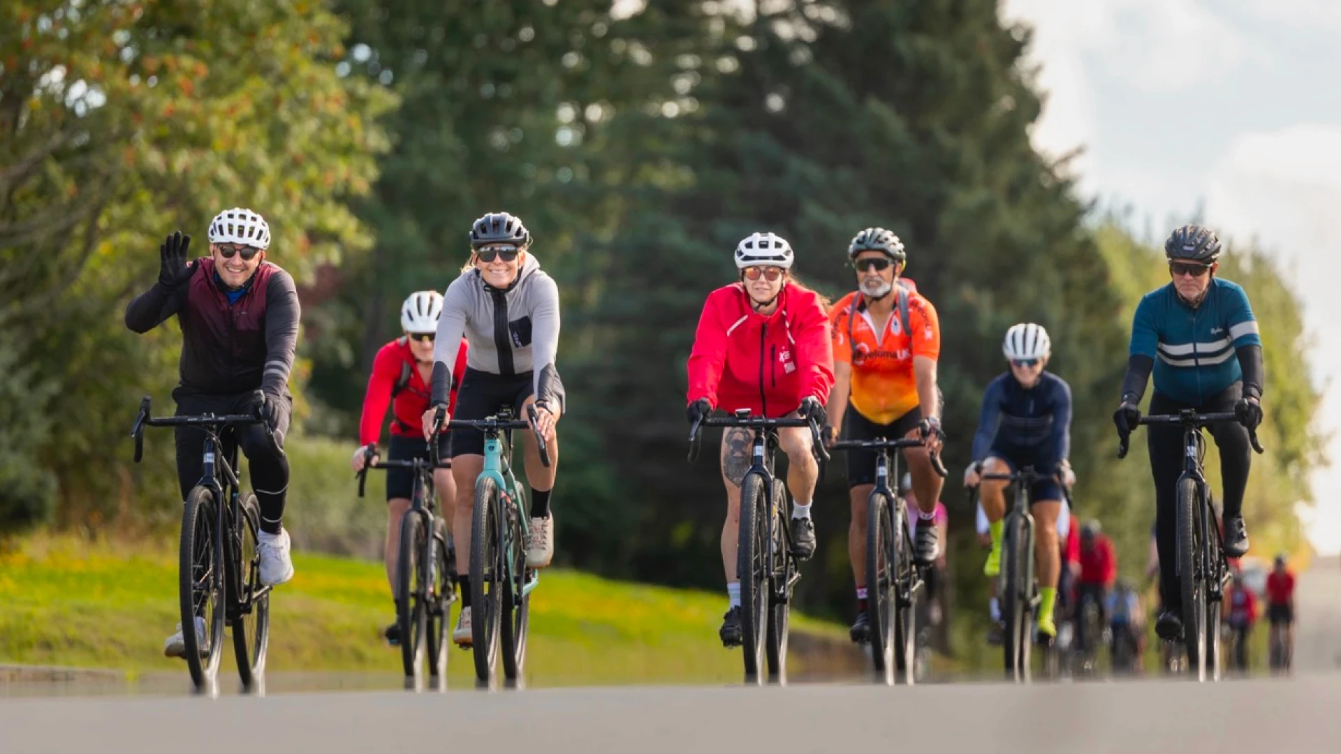 a group of happy people towards camera on a sunny day in iceland