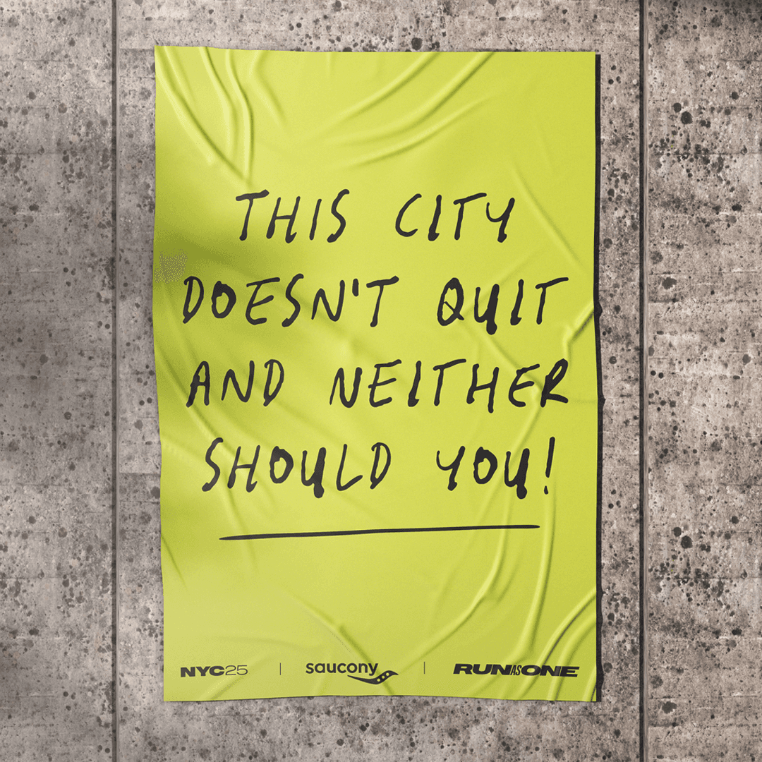 Editorial portrait of a bald model with a white clay mask on face and body, neutral backdrop.