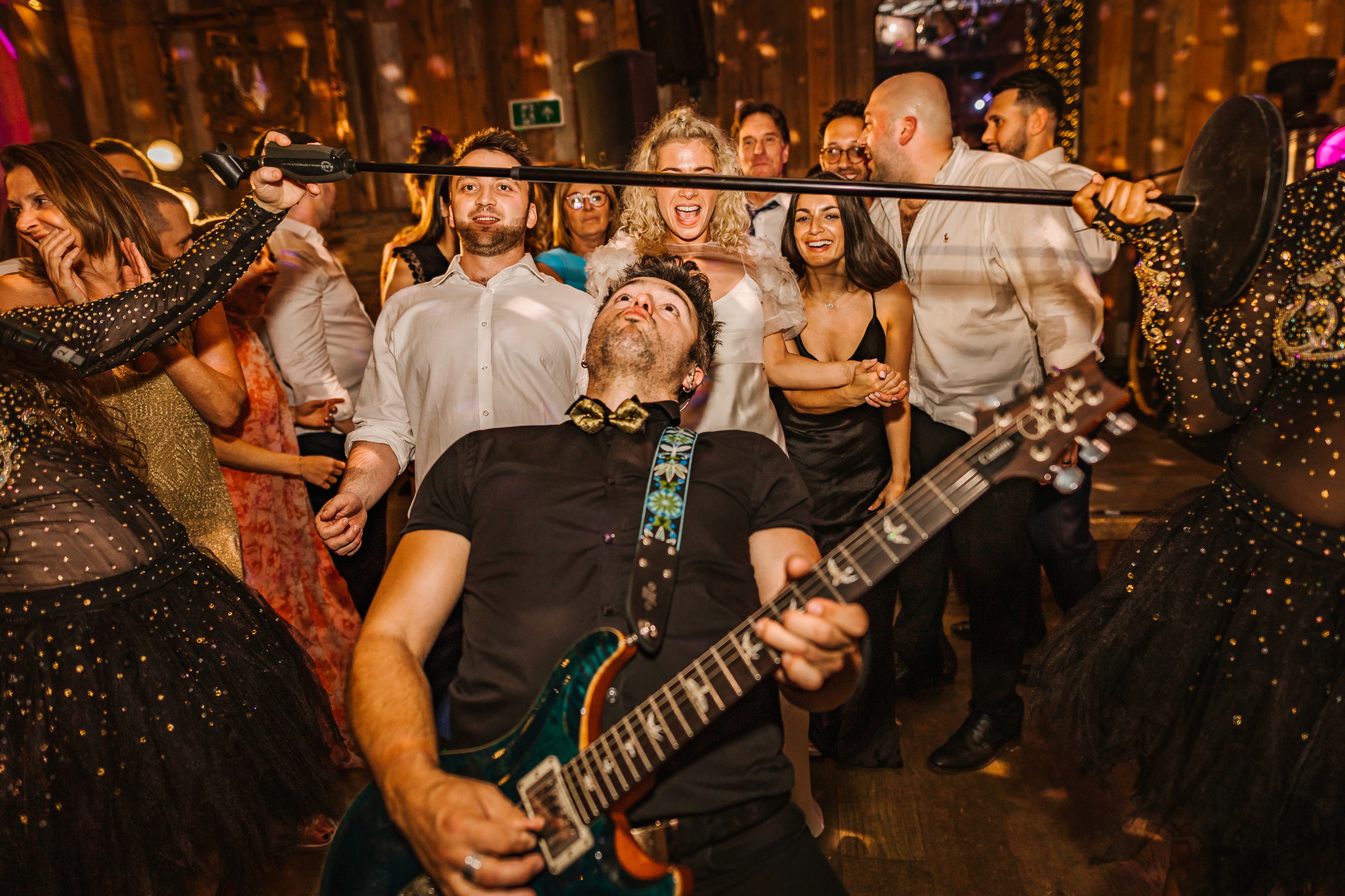 man playing electric guitar