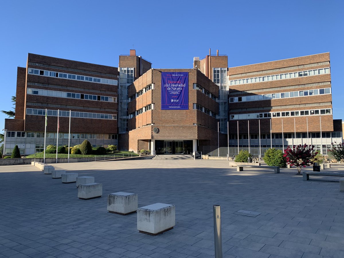 a building with trees and plants