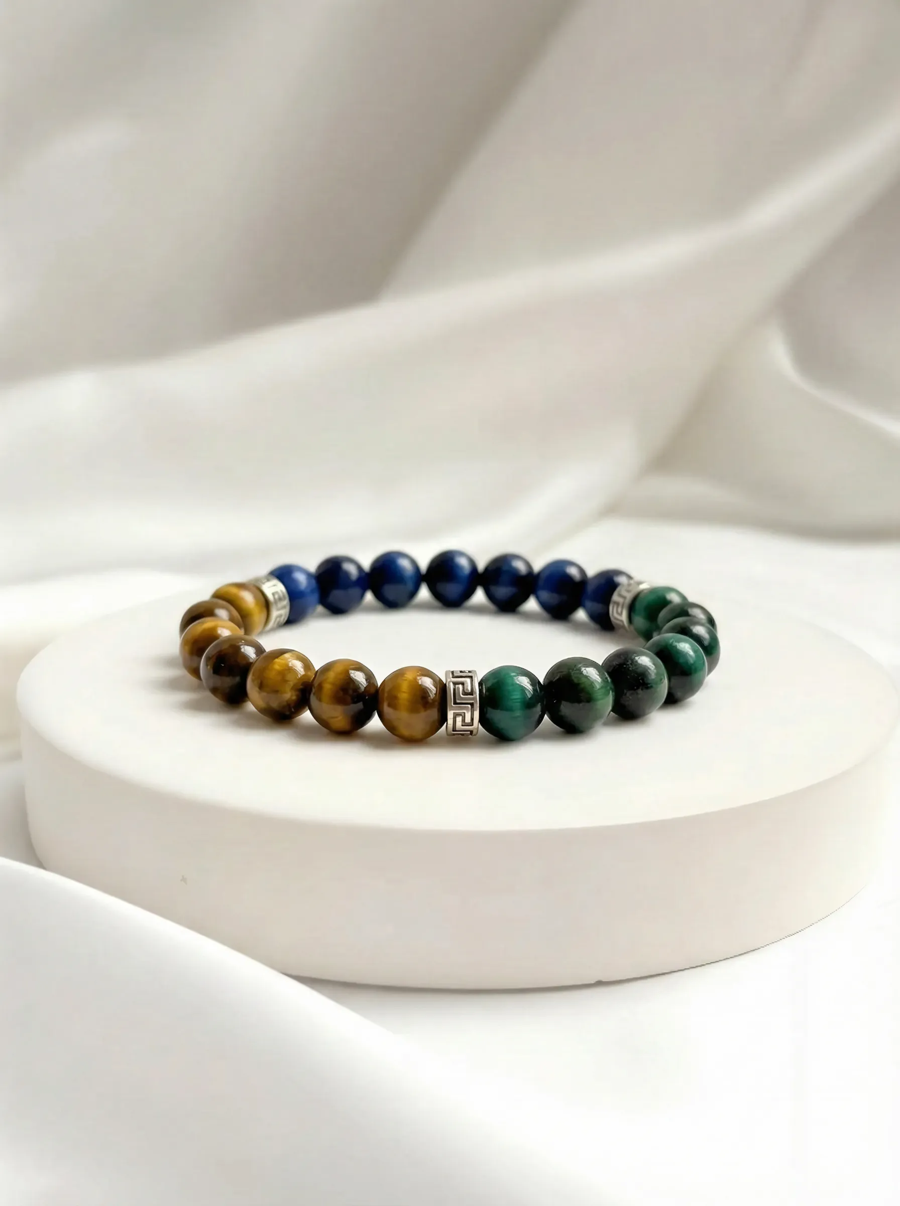 Trinity Shield bracelet in a studio setting.