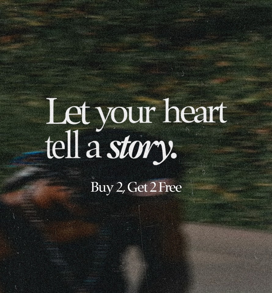 man in white shirt standing near window