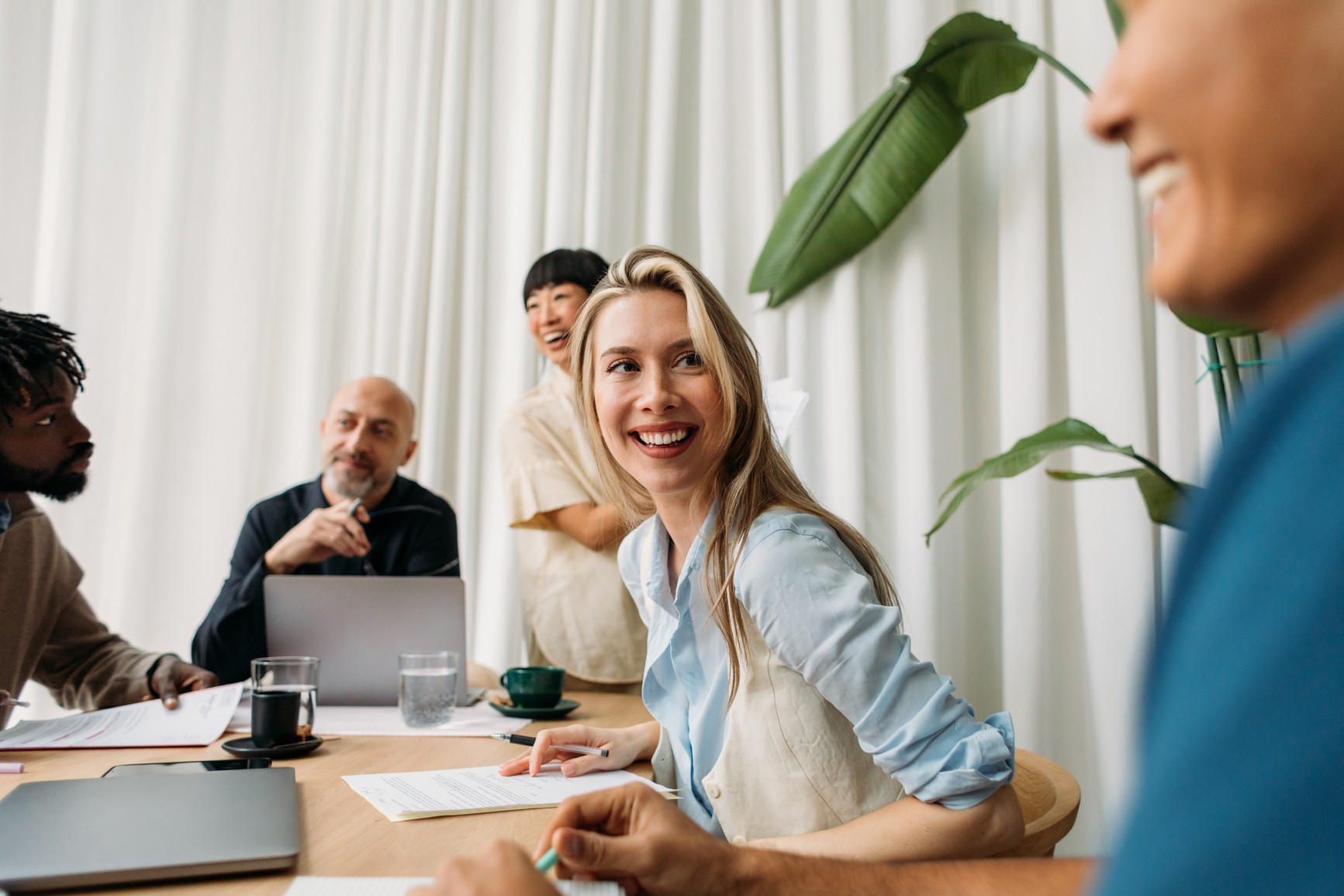 People smiling during a meeting