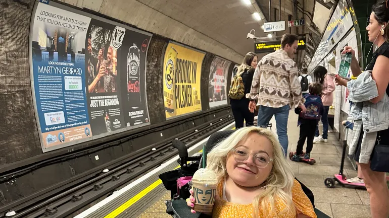 Gem at tube underground holding starbucks