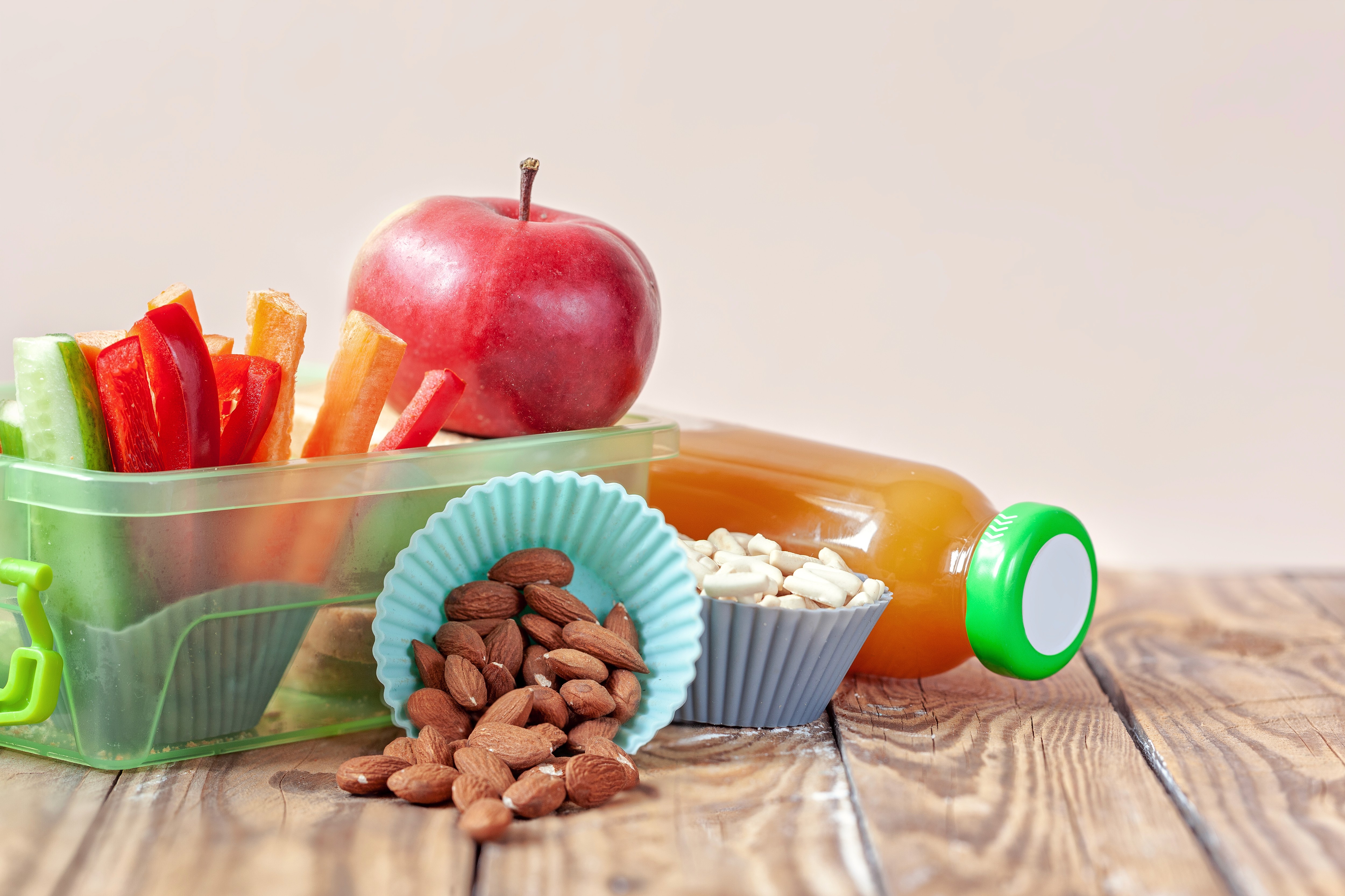 Assortment of healthy foods with a nutrition analysis display, showcasing comprehensive nutrition tracking by Caloric