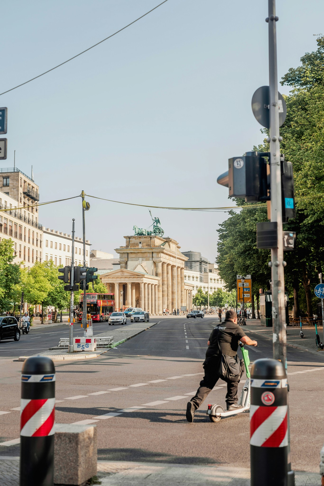 a person riding a skateboard down a street
