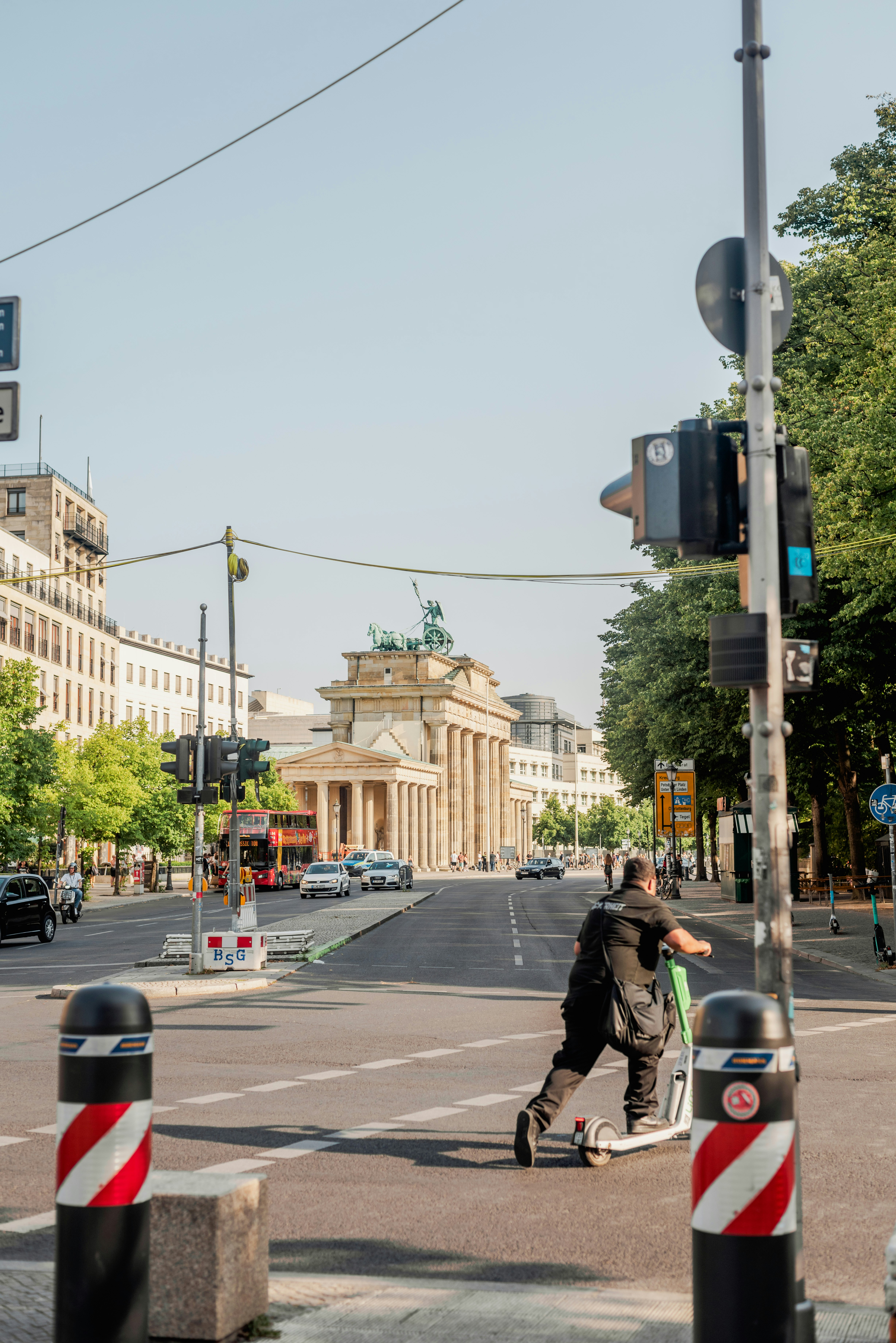 a person riding a skateboard down a street