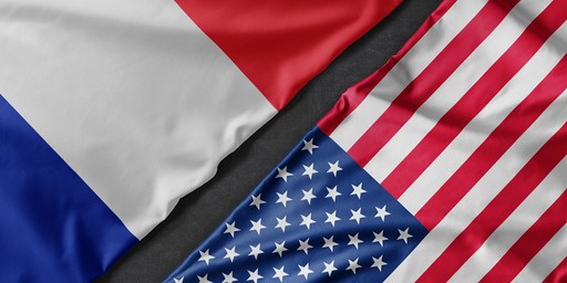 french and american flag, illlustrating comparison between france and usa