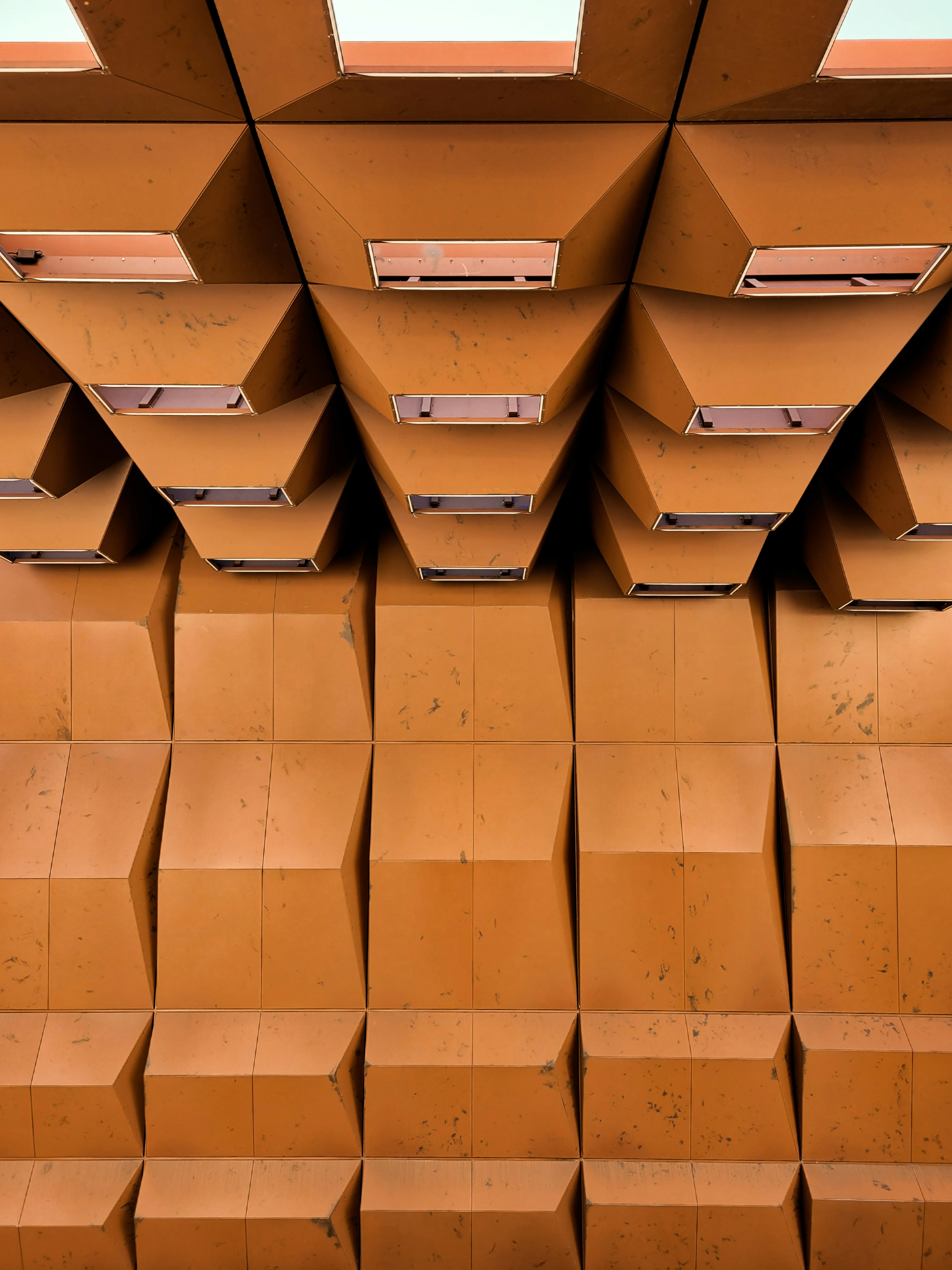 a room filled with lots of brown boxes