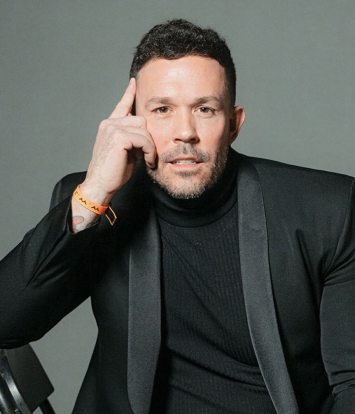 Ryan Zofay is engaging the audience at the Gladiator Summit event.