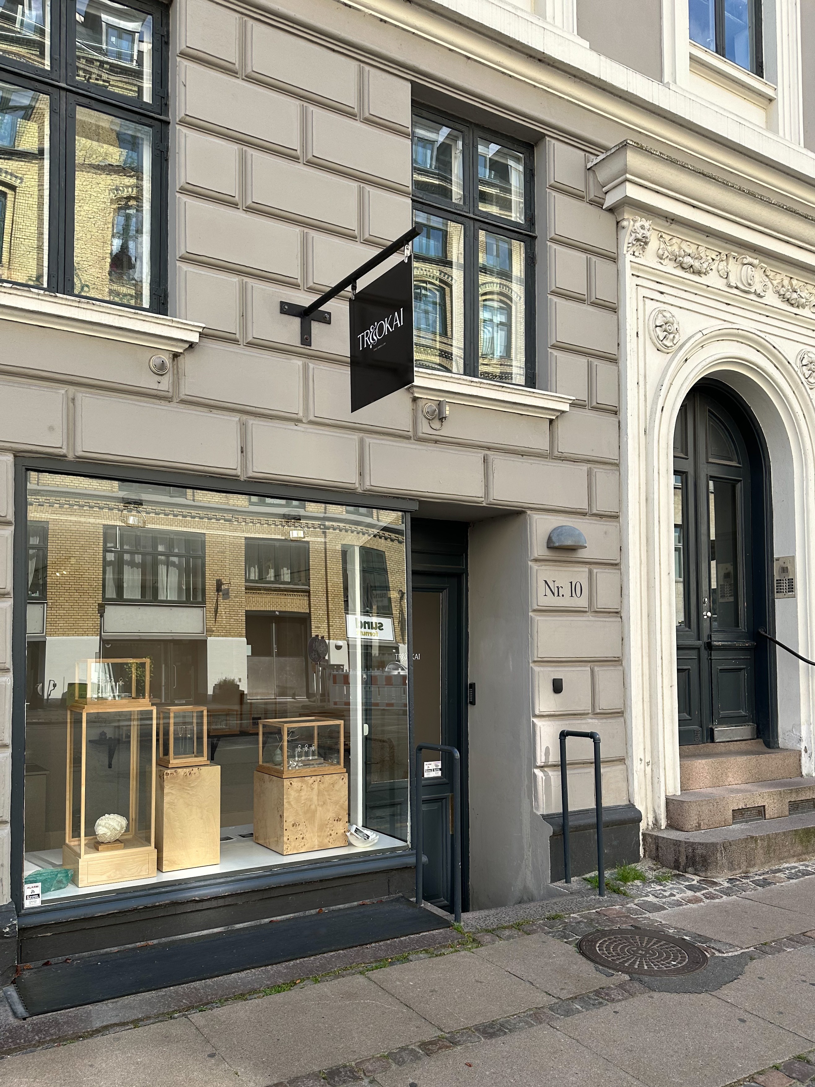 A close-up of a shelf with ceramic vases on it