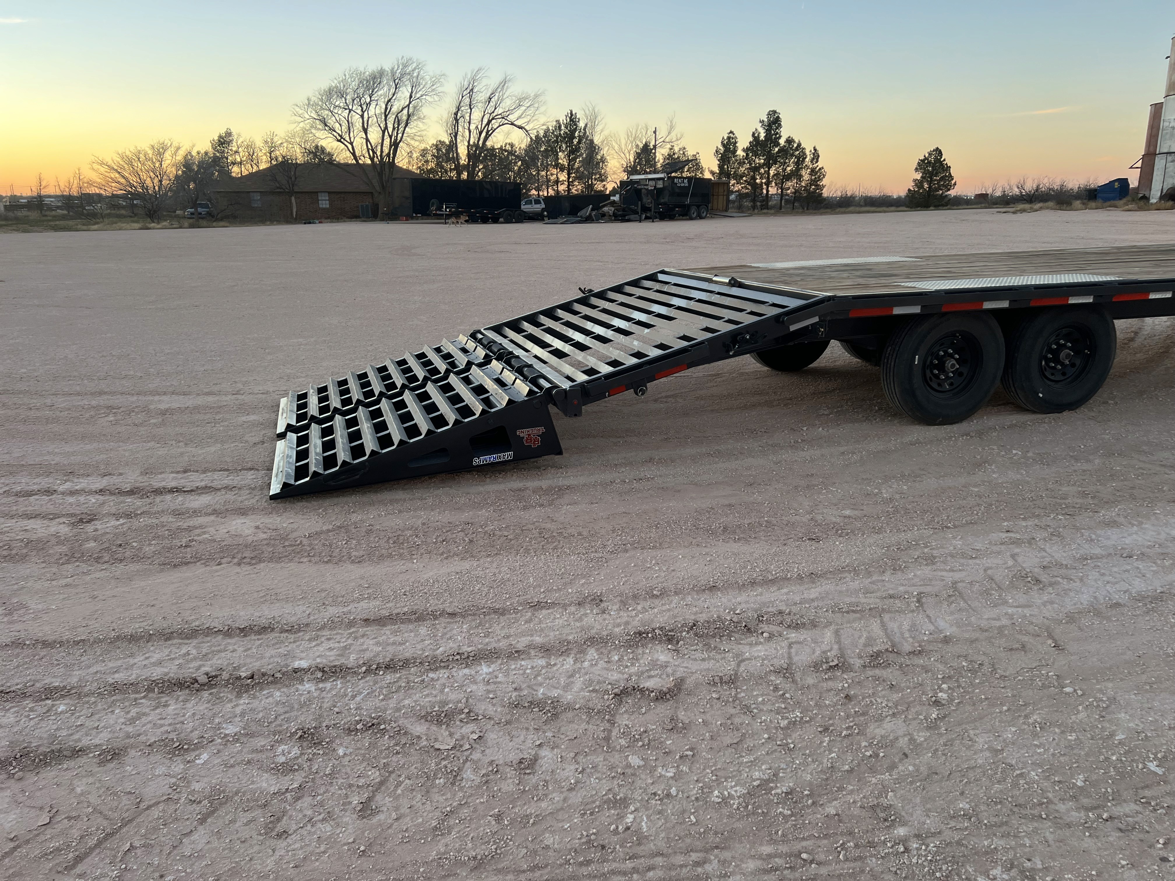 a man in a yellow shirt is working on a roof