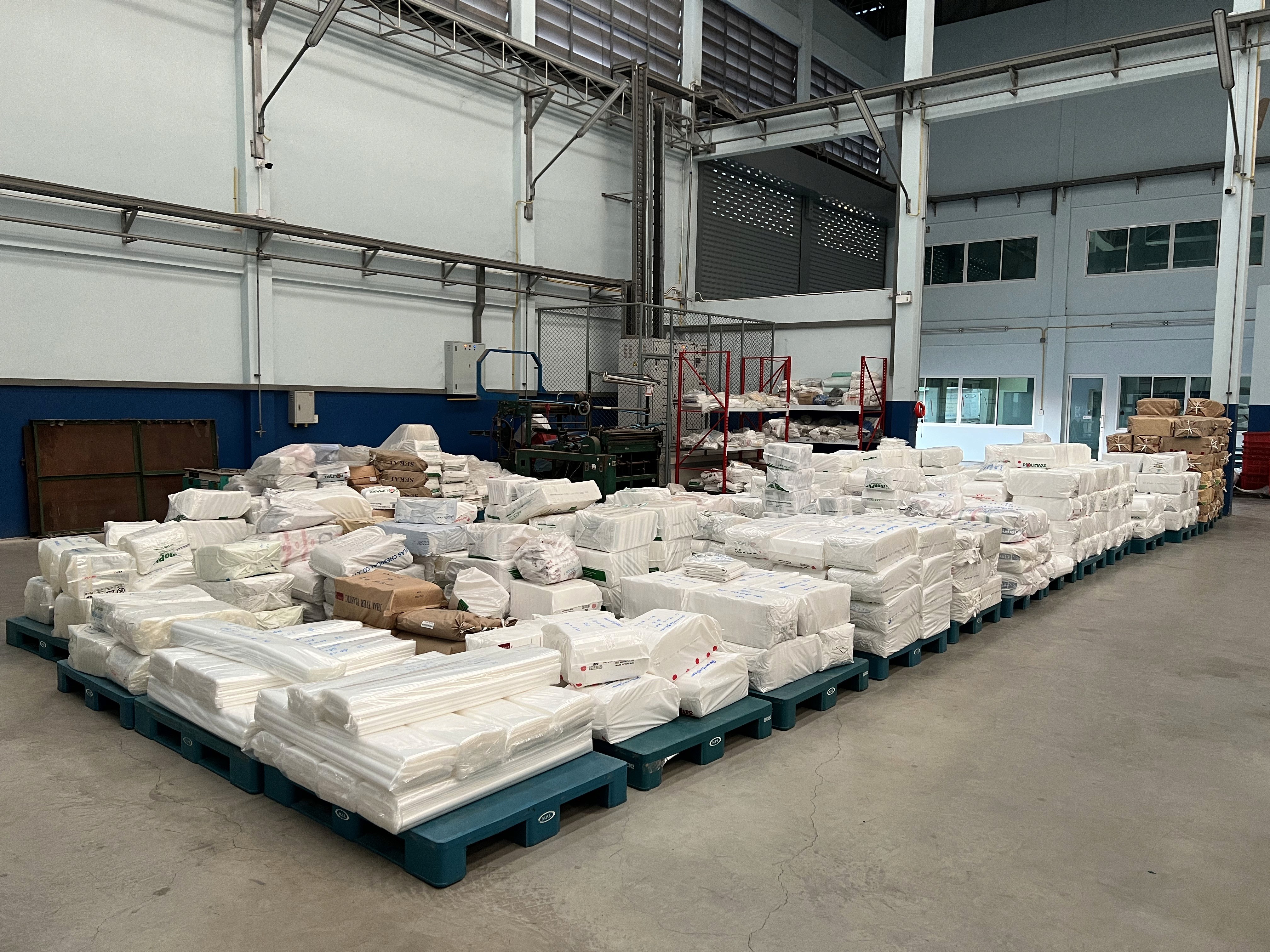 Factory floor with packed plastic materials