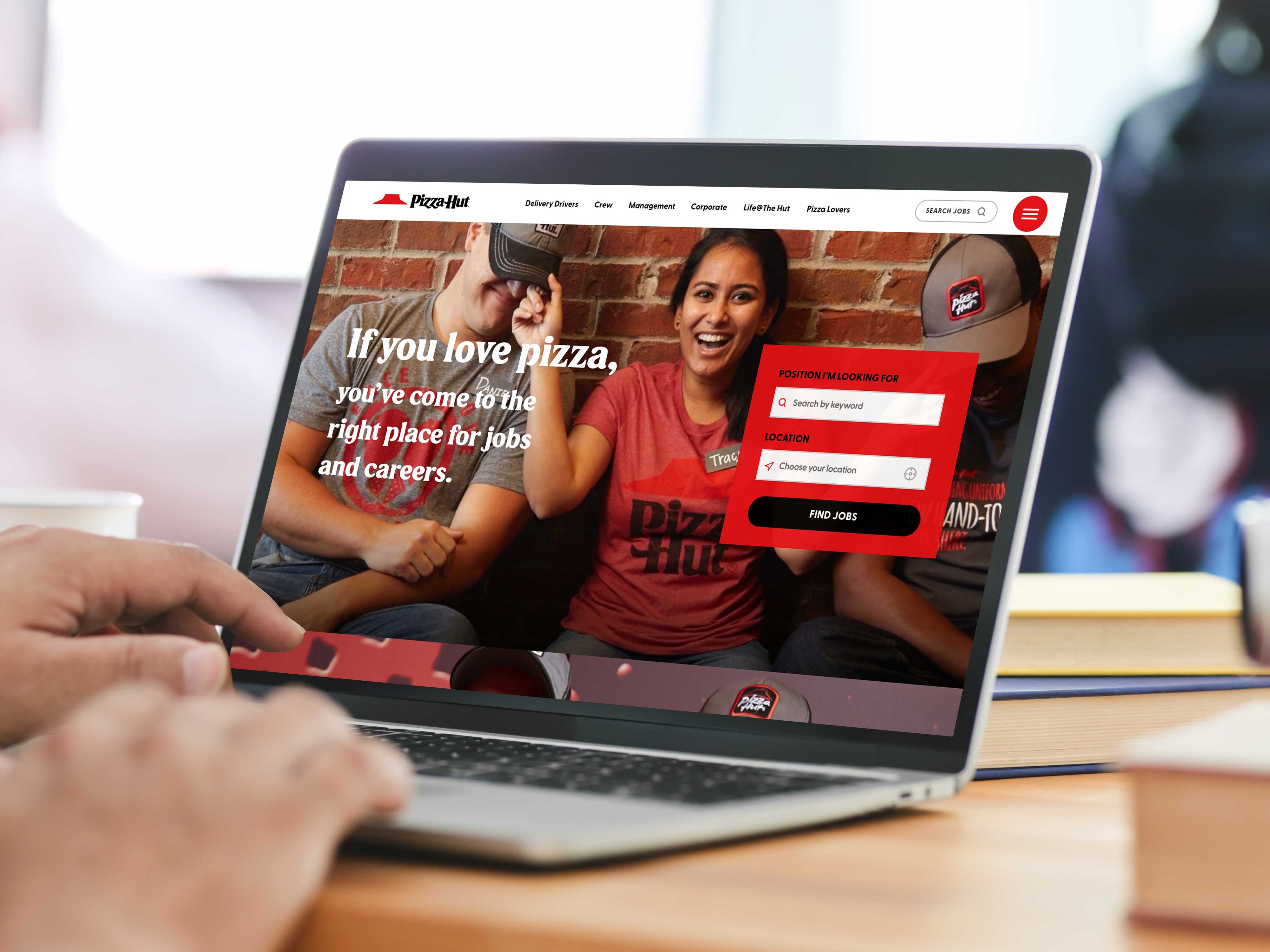 Design example of Pizza Hut's career site on laptop