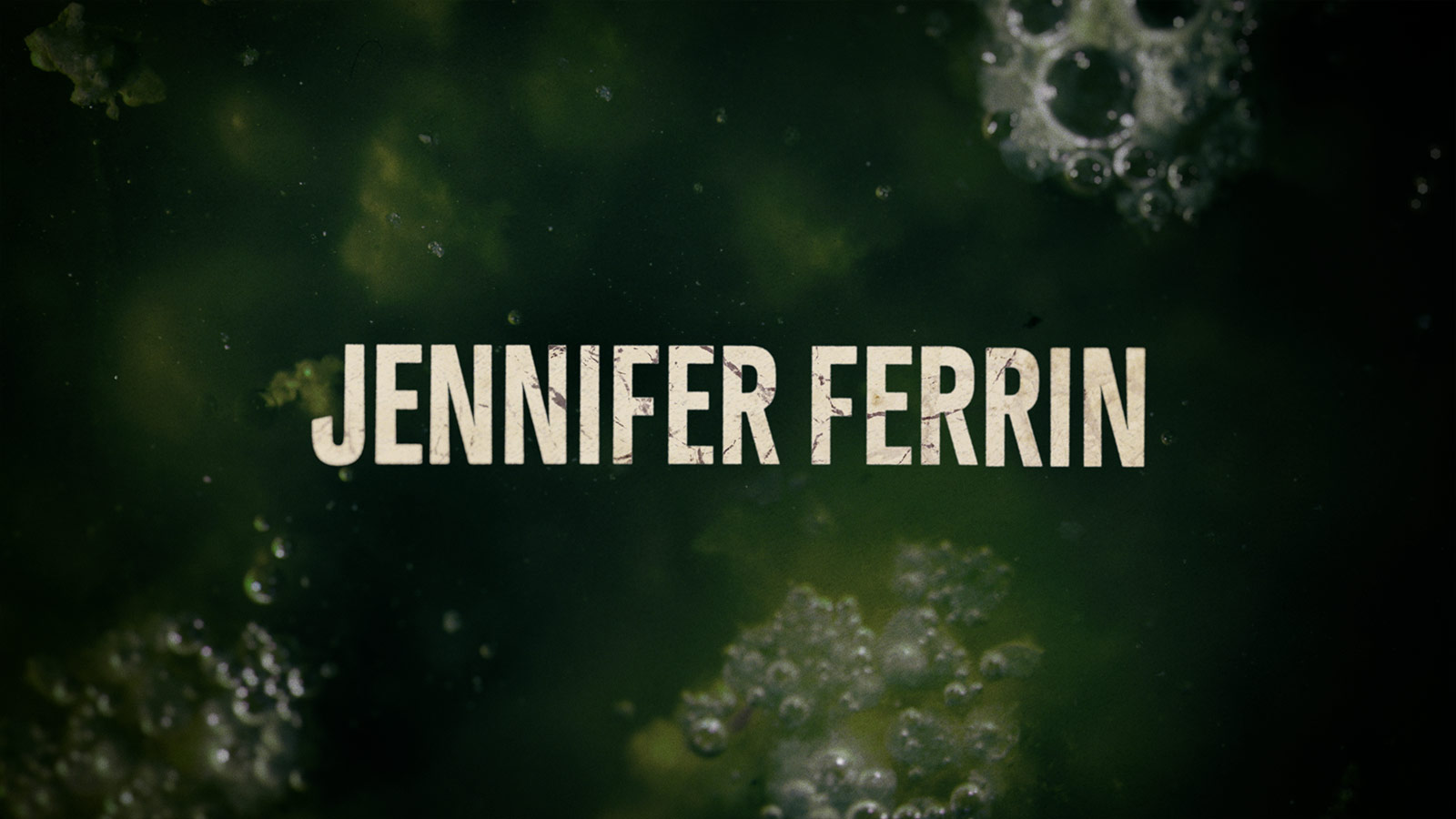 A frame displaying boiling liquid introduces actress Jennifer Ferrin in the American Horror Stories title sequence, evoking a sense of unease.