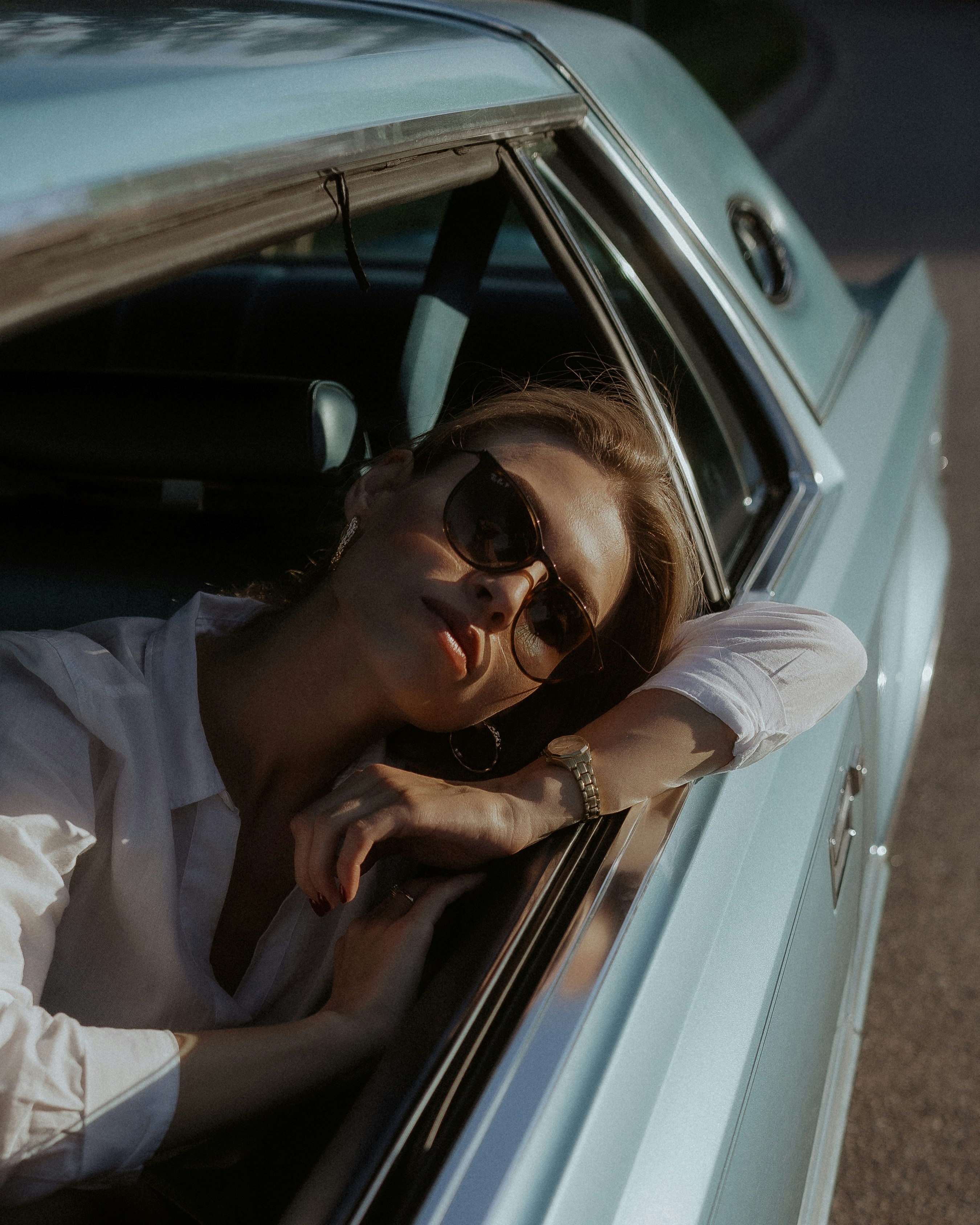 Aesthetic photo of a woman in car.