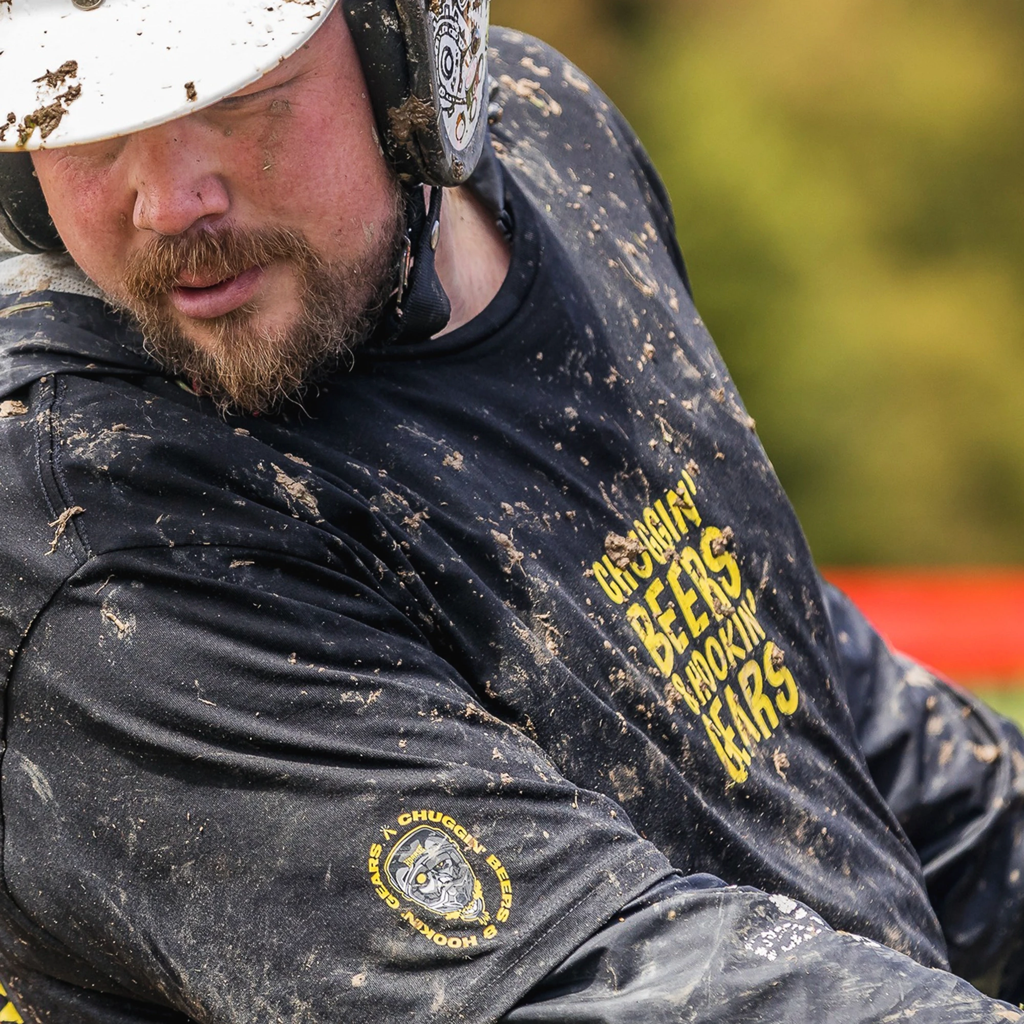 Close up of Chundy Hundy t-shirt graphics worn by racer during a race