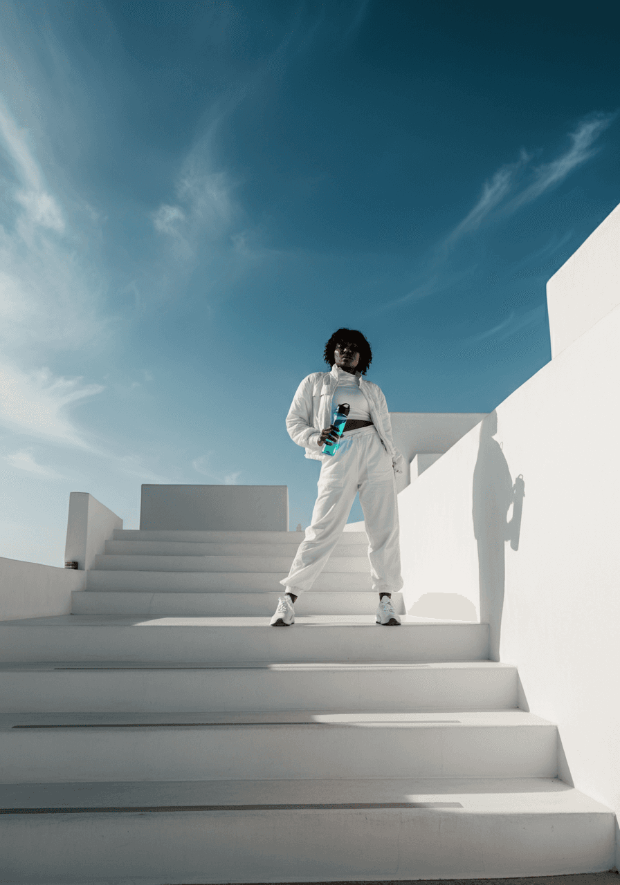 Woman standing on white steps