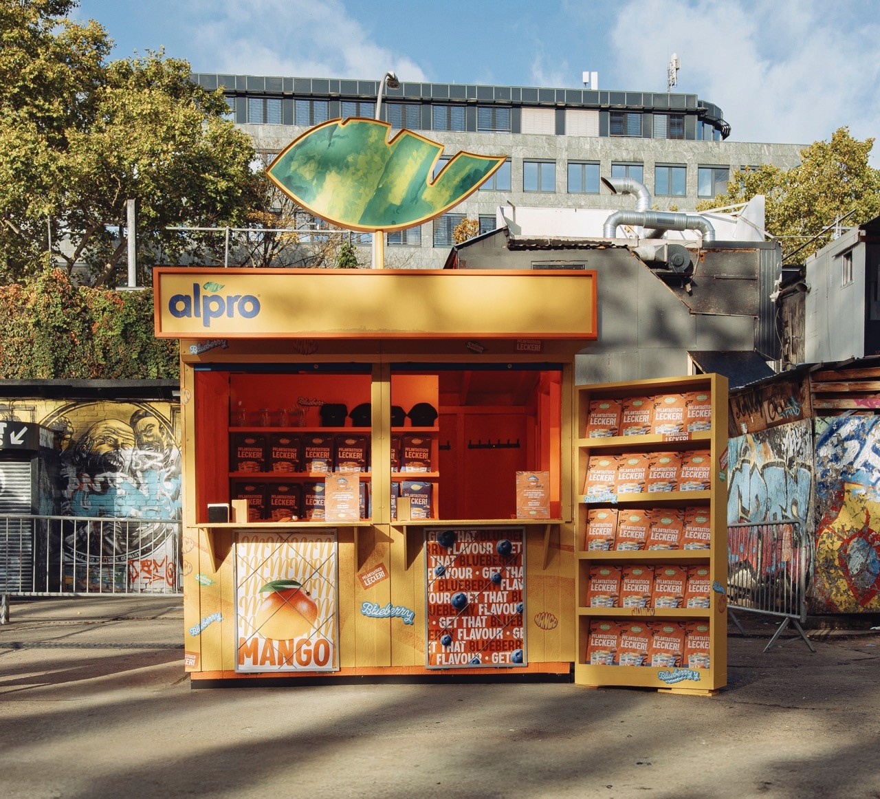 Woman wears a blue coat in a blue environment.