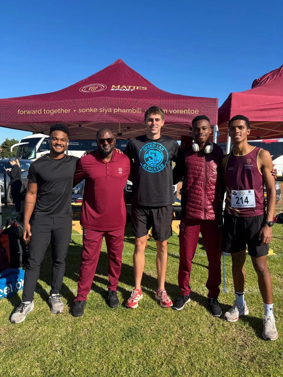 Speed Lab Athletics athletes and Coach Craven after a track competition