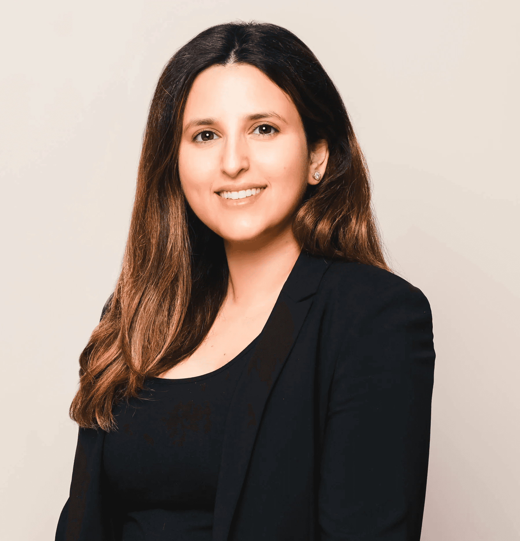 Nicole Cointreau, an attorney wearing a suit, headshot photograph looking at the camera