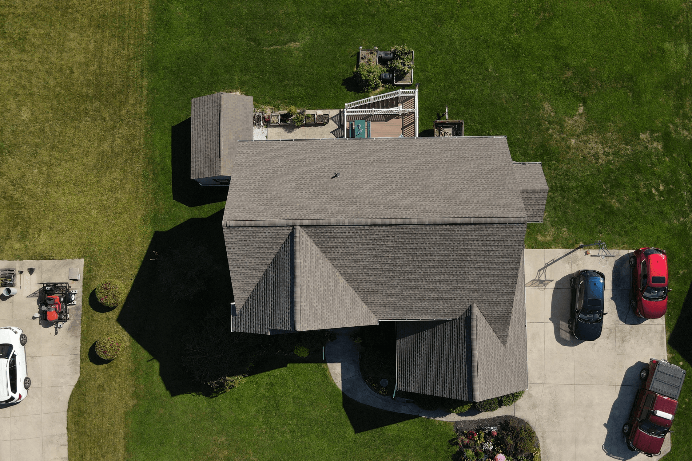 Drone shot of architectural weatheredwood roof installed on home in Kansas City, Missouri