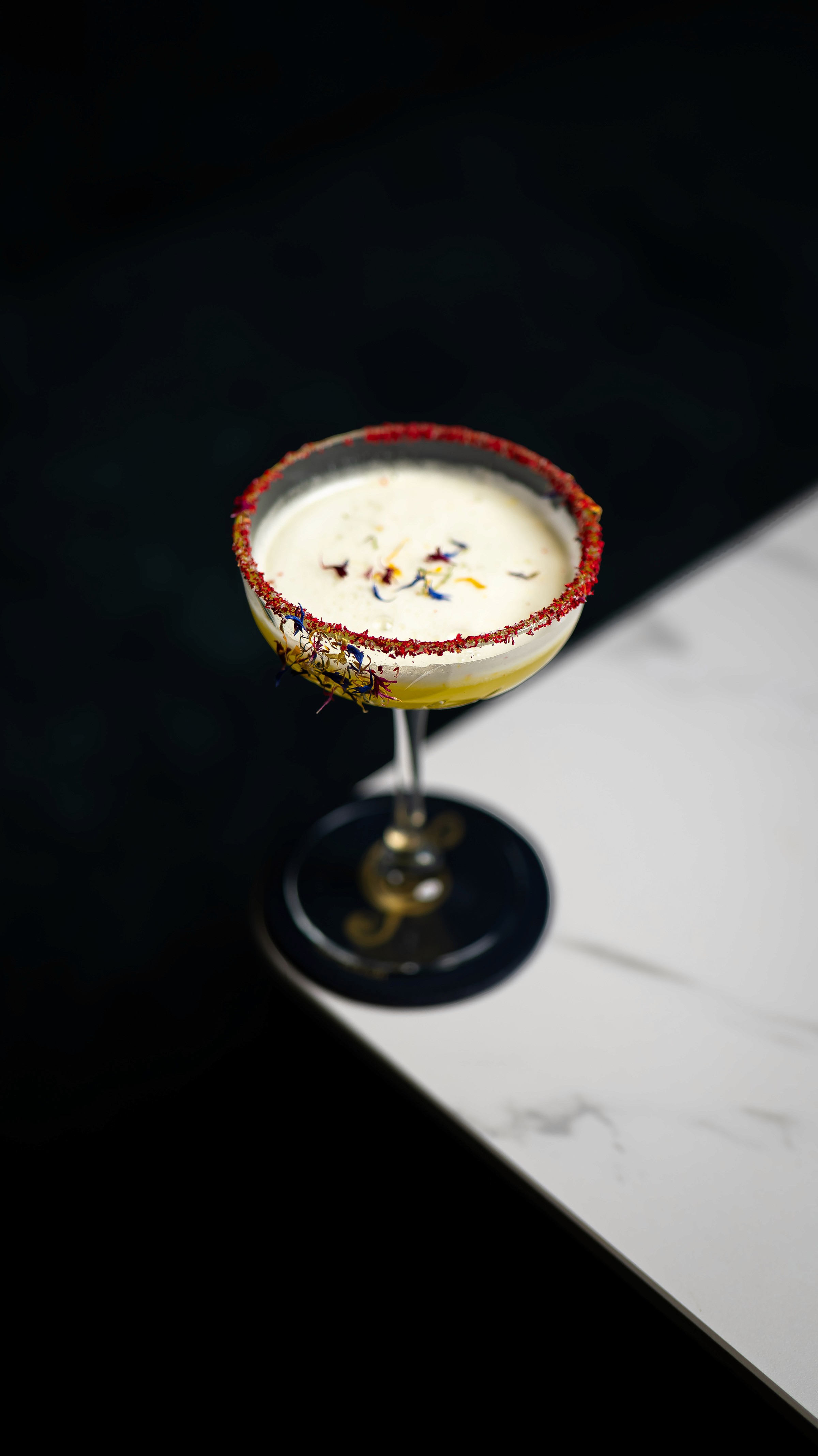 person writing on a piece of paper