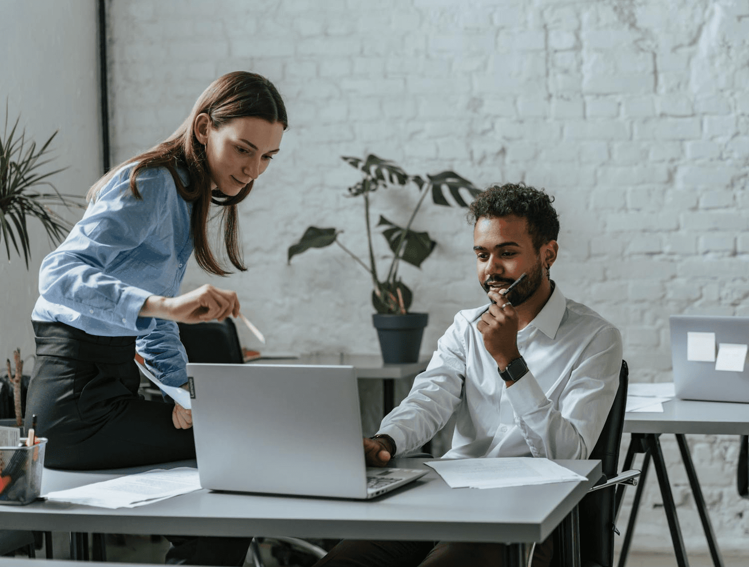 Two women laughing at work