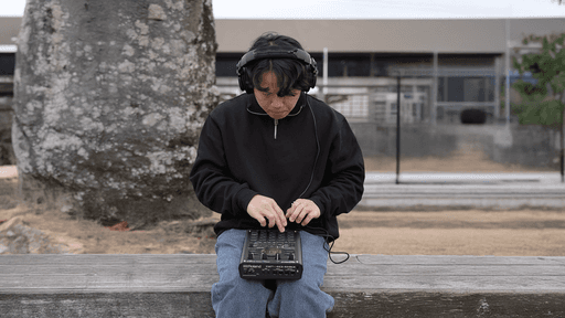 hotpotatoes, Singapore lo-fi producer and pianist Lebrone, creating music on a Roland SP-404MKII in a park in Japan