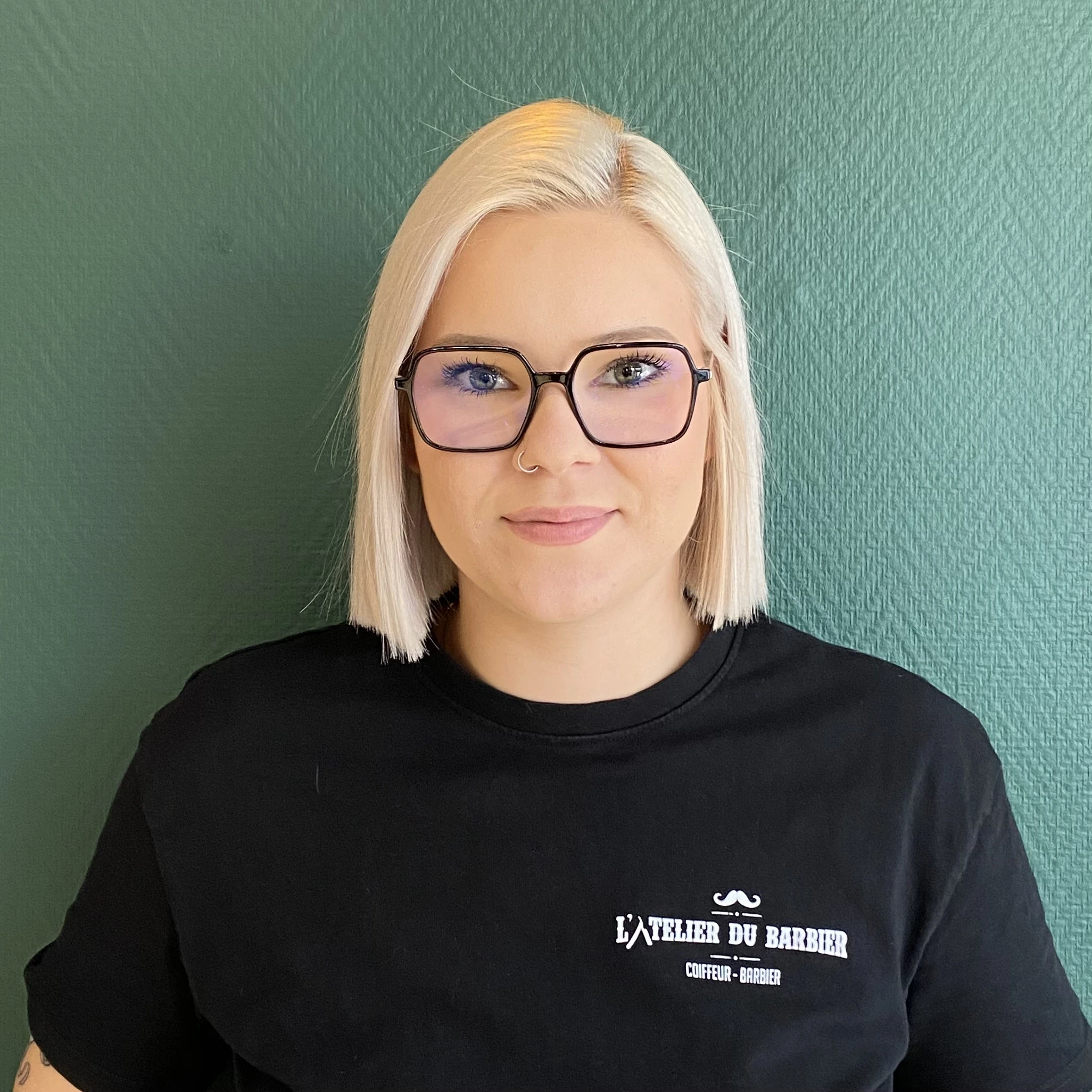 Two men talking, one wears a veteran hat.
