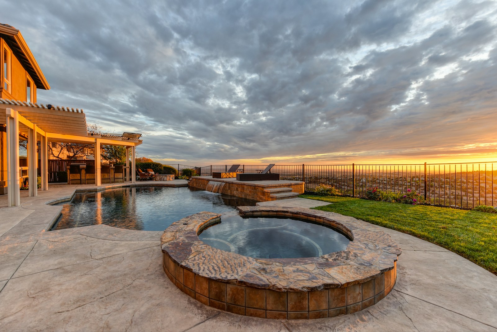 Hot tub on a backyard concrete patio