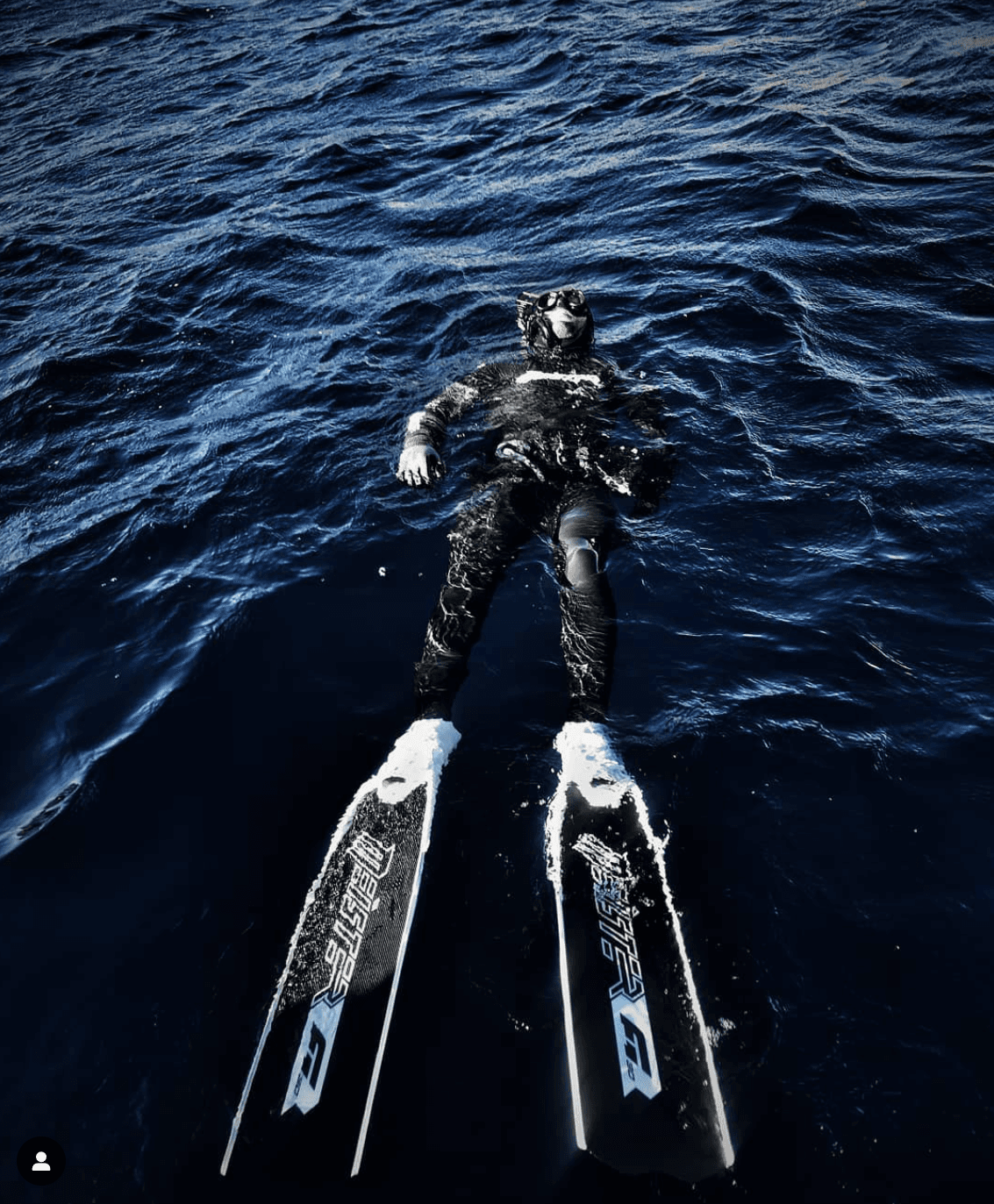 freediver meister on the surface of the water