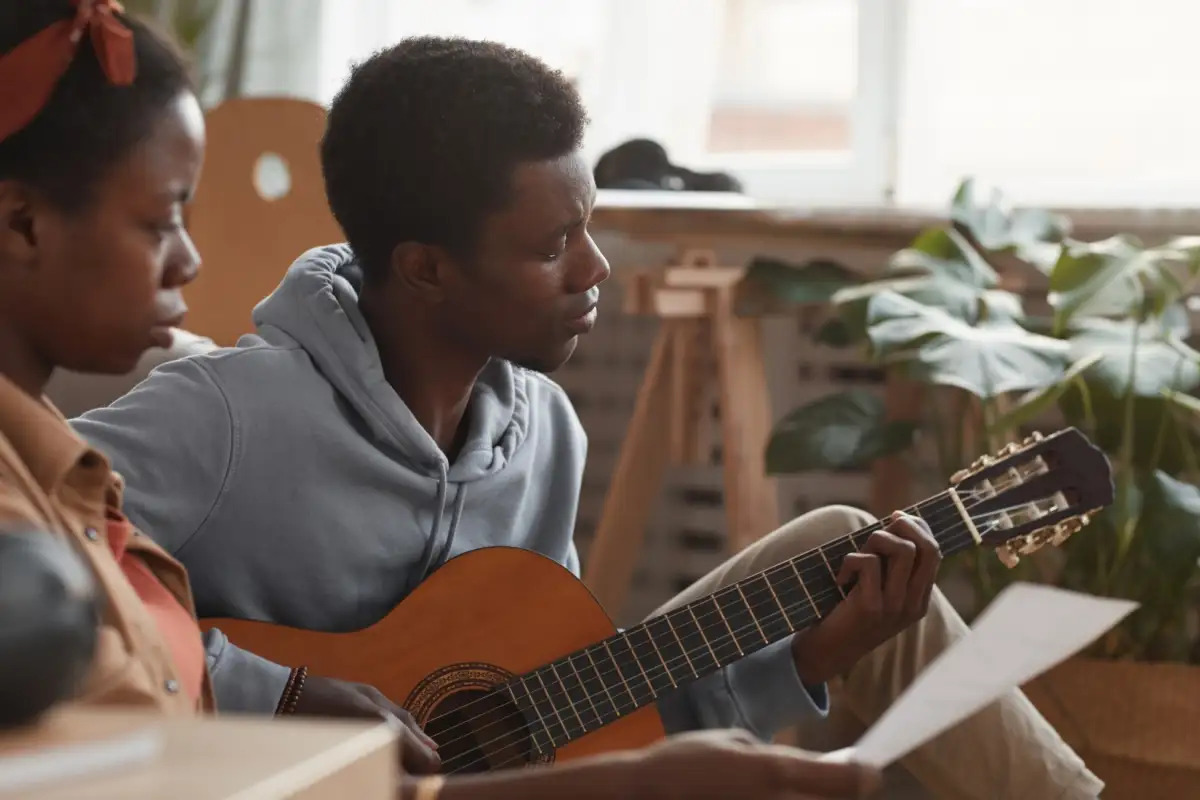 man with guitar - Best Music Platform for Artists