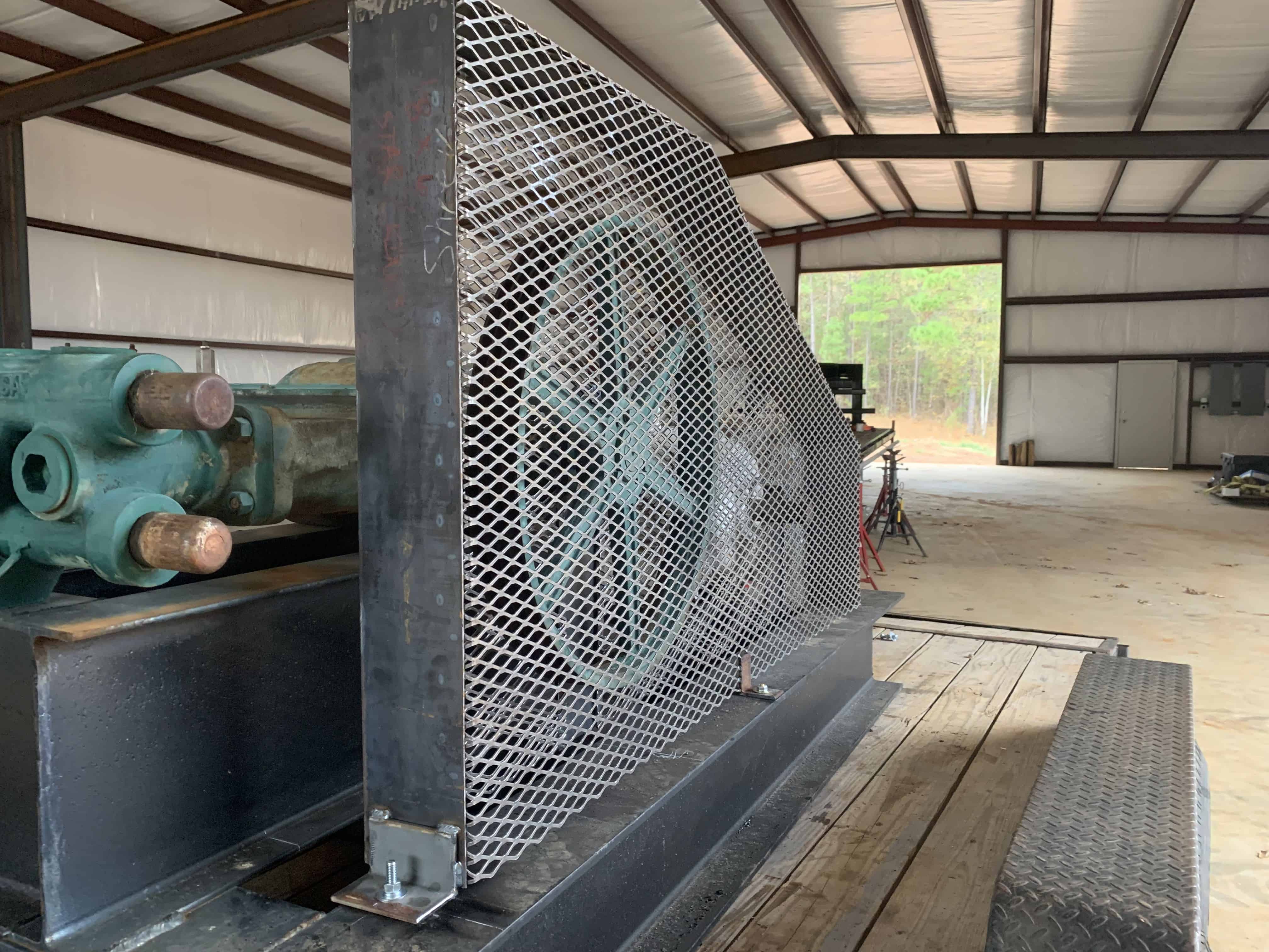 This is an expanded metal equipment guard we welded up for a clients machine.  This keeps operators safe and the equipment safe.  We added tabs to bolt down the guard to the equipment frame.  Basic welding services and fabrication were used to produce this equipment guard.