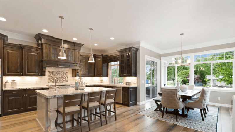 Gourmet kitchen remodel with dark wood cabinetry and large island in Chadds Ford, PA