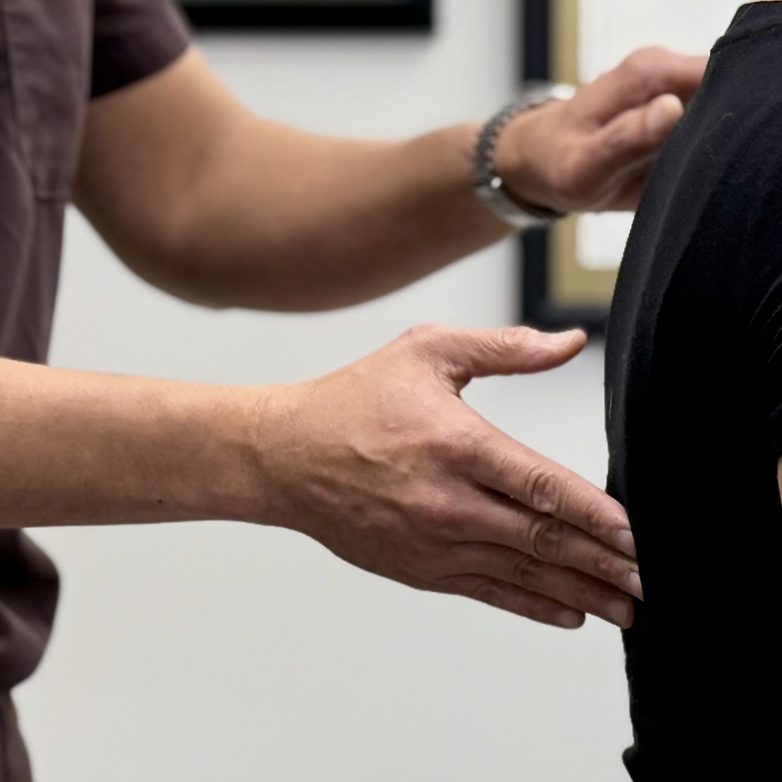 Dr. Le giving an assessment