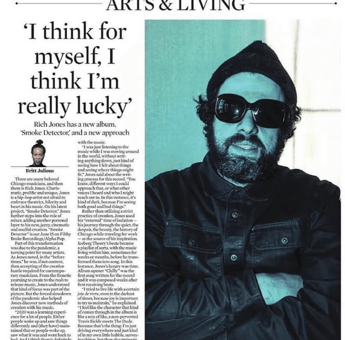 Woman with red hair covering mouth with hair