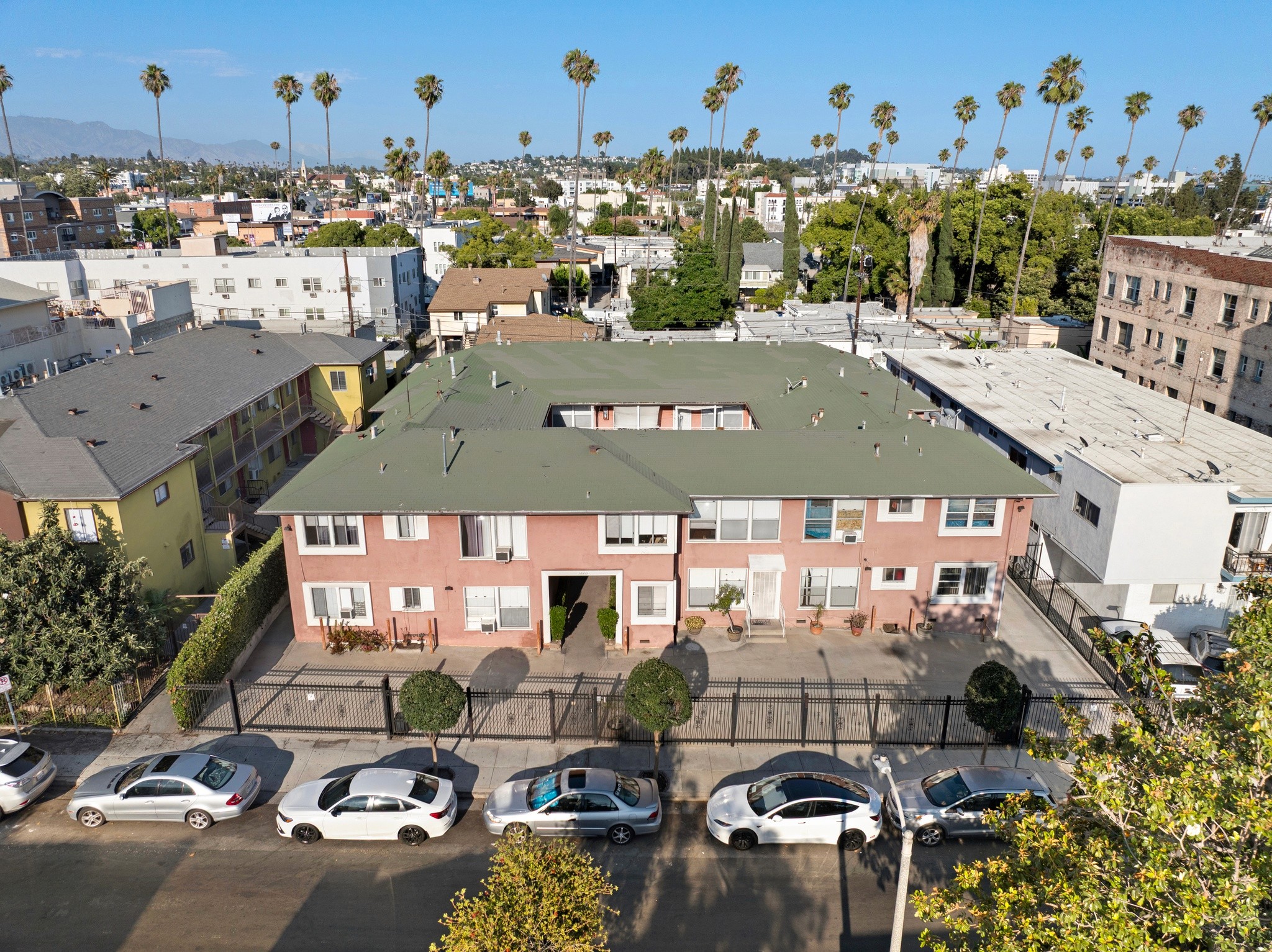 1640 N Harvard multi-unit residential complex aerial view showing rooftop, courtyard, and surrounding neighborhood