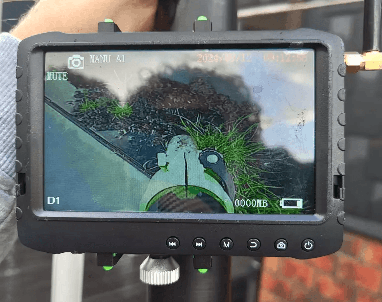 Camerasysteem van dakgoot stofzuiger