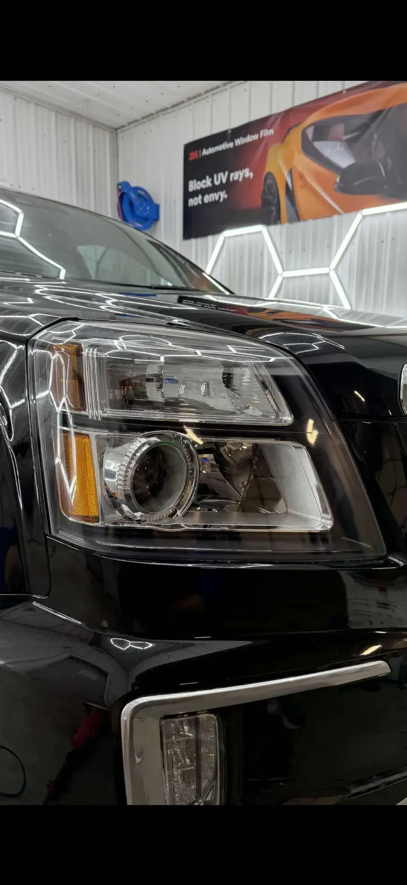 Black Car with new, restored headlight